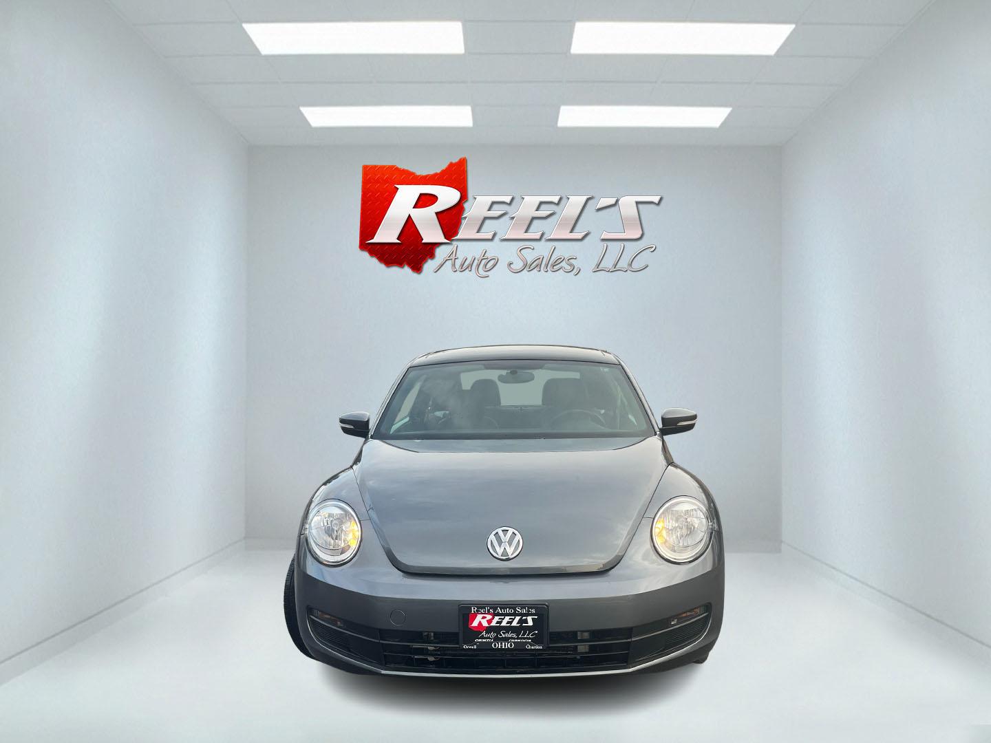 2015 Gray /Black Volkswagen Beetle 1.8T (3VWJ17ATXFM) with an 1.8L I4 DOHC 16V Turbo engine, Automatic transmission, located at 11115 Chardon Rd. , Chardon, OH, 44024, (440) 214-9705, 41.580246, -81.241943 - 2015 Volkswagen Beetle 1.8T – Iconic Style, Turbo Kick, and Pure Fun on Every Drive! This timeless 2015 Volkswagen Beetle 1.8T is ready to turn heads and put a smile on your face! Powered by a peppy 1.8L Turbocharged I4 engine paired with a smooth 6-speed automatic transmission, it delivers livel - Photo#1
