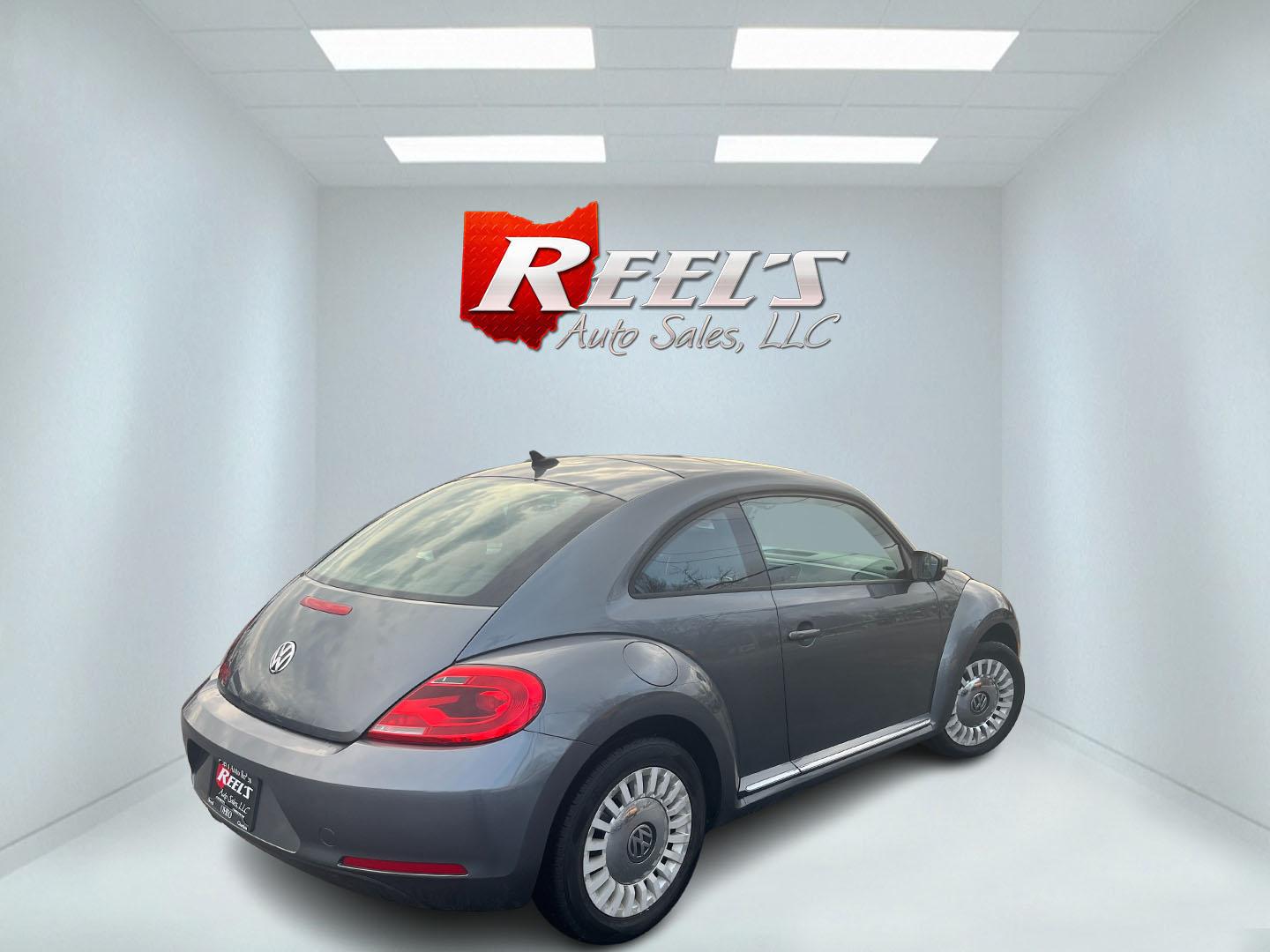 2015 Gray /Black Volkswagen Beetle 1.8T (3VWJ17ATXFM) with an 1.8L I4 DOHC 16V Turbo engine, Automatic transmission, located at 11115 Chardon Rd. , Chardon, OH, 44024, (440) 214-9705, 41.580246, -81.241943 - 2015 Volkswagen Beetle 1.8T – Iconic Style, Turbo Kick, and Pure Fun on Every Drive! This timeless 2015 Volkswagen Beetle 1.8T is ready to turn heads and put a smile on your face! Powered by a peppy 1.8L Turbocharged I4 engine paired with a smooth 6-speed automatic transmission, it delivers livel - Photo#5