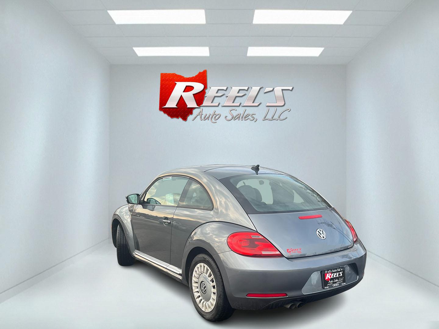 2015 Gray /Black Volkswagen Beetle 1.8T (3VWJ17ATXFM) with an 1.8L I4 DOHC 16V Turbo engine, Automatic transmission, located at 11115 Chardon Rd. , Chardon, OH, 44024, (440) 214-9705, 41.580246, -81.241943 - 2015 Volkswagen Beetle 1.8T – Iconic Style, Turbo Kick, and Pure Fun on Every Drive! This timeless 2015 Volkswagen Beetle 1.8T is ready to turn heads and put a smile on your face! Powered by a peppy 1.8L Turbocharged I4 engine paired with a smooth 6-speed automatic transmission, it delivers livel - Photo#7