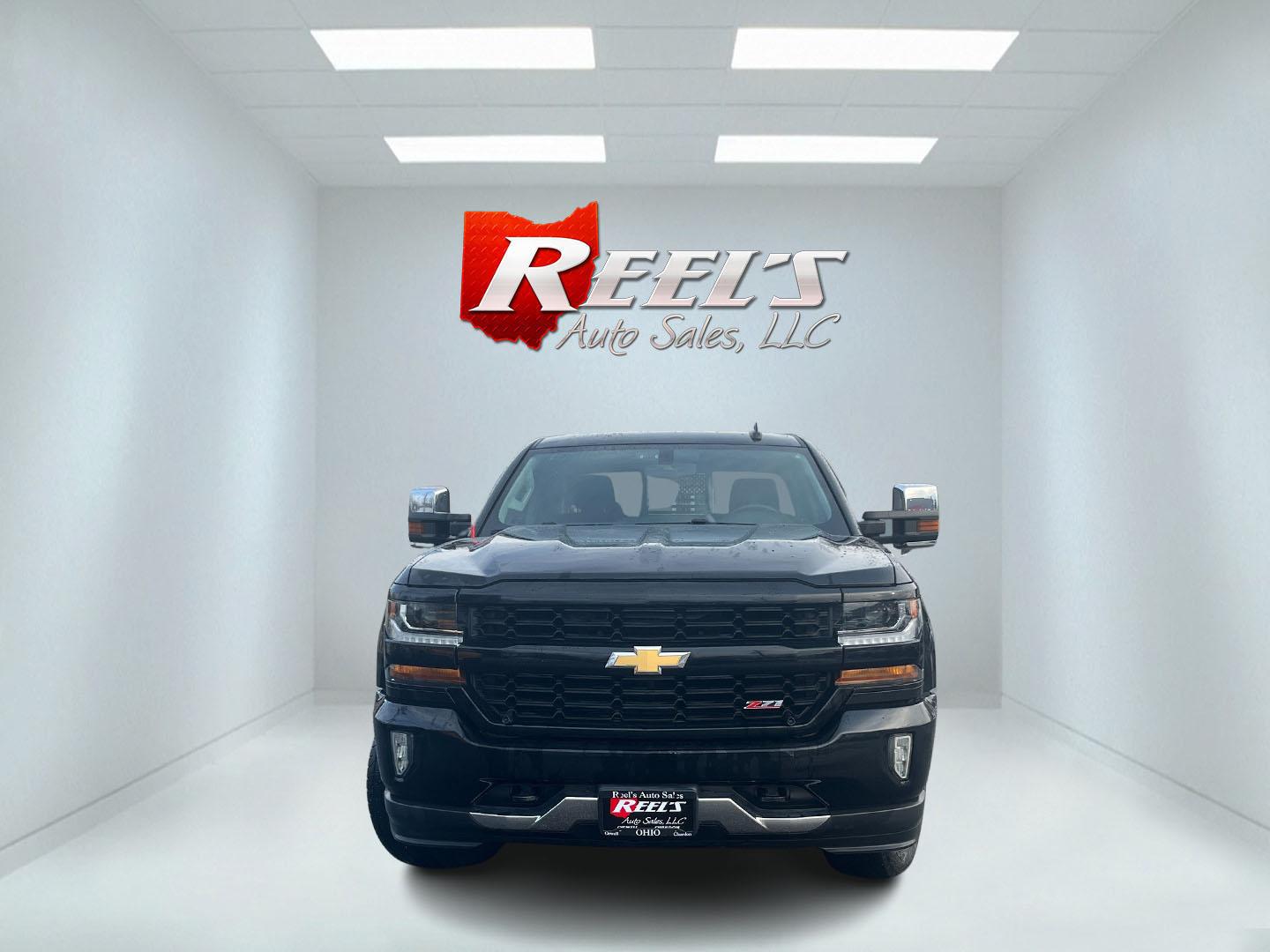 2018 Black /Black Chevrolet Silverado 1500 LT Z71 Double Cab 4WD (1GCVKREC9JZ) with an 5.3L V8 OHV 16V engine, Automatic transmission, located at 11115 Chardon Rd. , Chardon, OH, 44024, (440) 214-9705, 41.580246, -81.241943 - 2018 Chevrolet Silverado LT Z71 Double Cab 4WD – Built Tough, Ready to Tow, and Loaded with Off-Road Attitude! This beast of a 2018 Chevrolet Silverado LT Z71 Double Cab 4WD is primed for work, play, and everything in between! The powerful 5.3L EcoTec3 V8 engine roars through a smooth transmissio - Photo#1