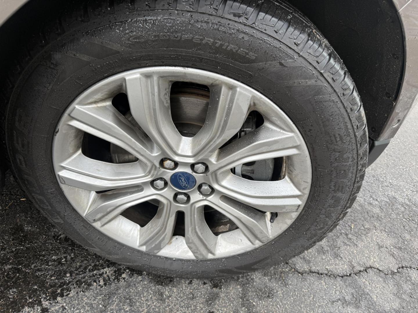 2019 Gray Ford Edge Titanium AWD (2FMPK4K99KB) with an 2.0L L4 DOHC 16V Turbo engine, Automatic transmission, located at 547 E. Main St., Orwell, OH, 44076, (440) 437-5893, 41.535435, -80.847855 - 2019 Ford Edge Titanium AWD – Top-Tier Luxury, Turbo Thrills, and Every Premium Feature You Crave! This 2019 Ford Edge Titanium AWD is loaded to the gills and ready to elevate every drive! The responsive 2.0L Turbocharged EcoBoost I4 engine teams up with a slick 8-speed automatic transmission and - Photo#5