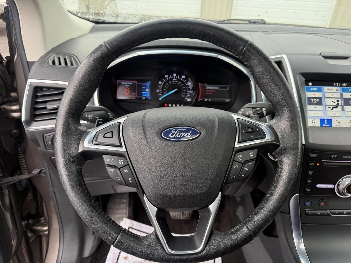 2019 Gray Ford Edge Titanium AWD (2FMPK4K99KB) with an 2.0L L4 DOHC 16V Turbo engine, Automatic transmission, located at 547 E. Main St., Orwell, OH, 44076, (440) 437-5893, 41.535435, -80.847855 - 2019 Ford Edge Titanium AWD – Top-Tier Luxury, Turbo Thrills, and Every Premium Feature You Crave! This 2019 Ford Edge Titanium AWD is loaded to the gills and ready to elevate every drive! The responsive 2.0L Turbocharged EcoBoost I4 engine teams up with a slick 8-speed automatic transmission and - Photo#12