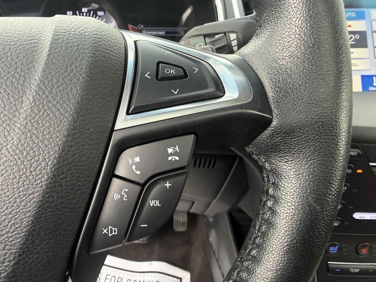 2019 Gray Ford Edge Titanium AWD (2FMPK4K99KB) with an 2.0L L4 DOHC 16V Turbo engine, Automatic transmission, located at 547 E. Main St., Orwell, OH, 44076, (440) 437-5893, 41.535435, -80.847855 - 2019 Ford Edge Titanium AWD – Top-Tier Luxury, Turbo Thrills, and Every Premium Feature You Crave! This 2019 Ford Edge Titanium AWD is loaded to the gills and ready to elevate every drive! The responsive 2.0L Turbocharged EcoBoost I4 engine teams up with a slick 8-speed automatic transmission and - Photo#14