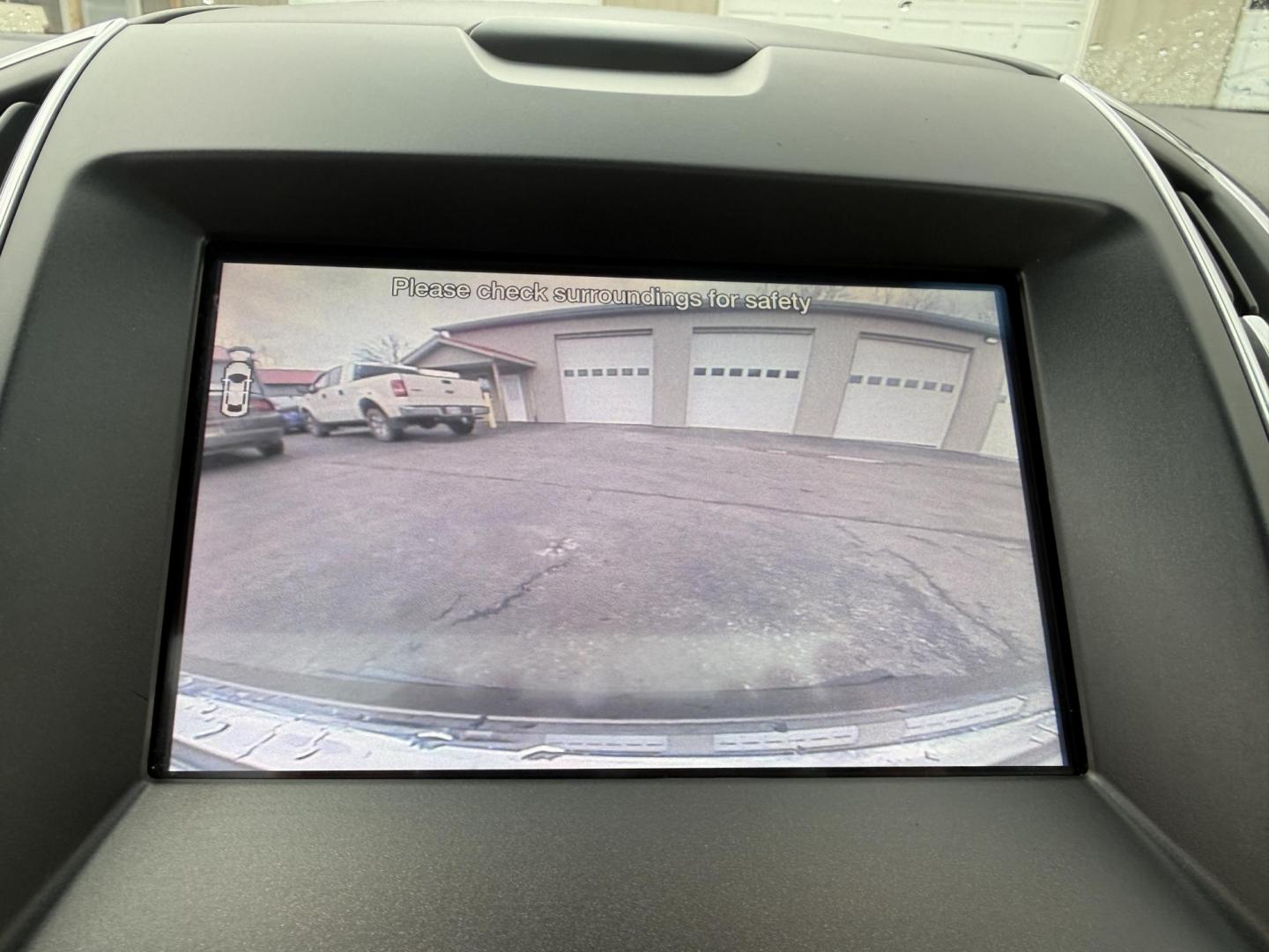 2019 Gray Ford Edge Titanium AWD (2FMPK4K99KB) with an 2.0L L4 DOHC 16V Turbo engine, Automatic transmission, located at 547 E. Main St., Orwell, OH, 44076, (440) 437-5893, 41.535435, -80.847855 - 2019 Ford Edge Titanium AWD – Top-Tier Luxury, Turbo Thrills, and Every Premium Feature You Crave! This 2019 Ford Edge Titanium AWD is loaded to the gills and ready to elevate every drive! The responsive 2.0L Turbocharged EcoBoost I4 engine teams up with a slick 8-speed automatic transmission and - Photo#19