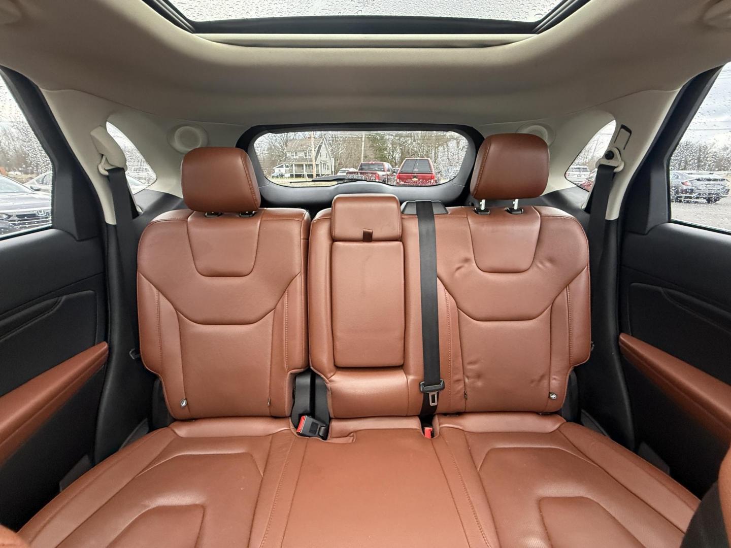 2019 Gray Ford Edge Titanium AWD (2FMPK4K99KB) with an 2.0L L4 DOHC 16V Turbo engine, Automatic transmission, located at 547 E. Main St., Orwell, OH, 44076, (440) 437-5893, 41.535435, -80.847855 - 2019 Ford Edge Titanium AWD – Top-Tier Luxury, Turbo Thrills, and Every Premium Feature You Crave! This 2019 Ford Edge Titanium AWD is loaded to the gills and ready to elevate every drive! The responsive 2.0L Turbocharged EcoBoost I4 engine teams up with a slick 8-speed automatic transmission and - Photo#23