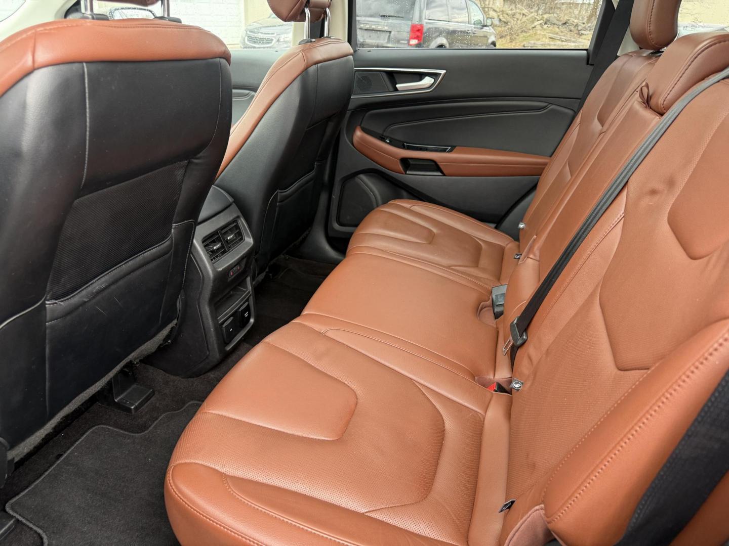 2019 Gray Ford Edge Titanium AWD (2FMPK4K99KB) with an 2.0L L4 DOHC 16V Turbo engine, Automatic transmission, located at 547 E. Main St., Orwell, OH, 44076, (440) 437-5893, 41.535435, -80.847855 - 2019 Ford Edge Titanium AWD – Top-Tier Luxury, Turbo Thrills, and Every Premium Feature You Crave! This 2019 Ford Edge Titanium AWD is loaded to the gills and ready to elevate every drive! The responsive 2.0L Turbocharged EcoBoost I4 engine teams up with a slick 8-speed automatic transmission and - Photo#24