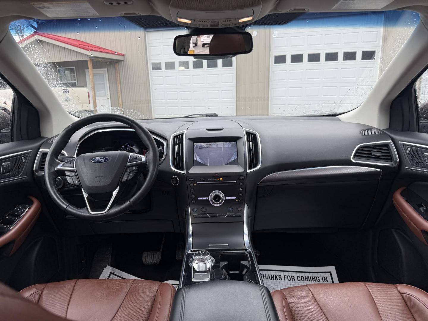 2019 Gray Ford Edge Titanium AWD (2FMPK4K99KB) with an 2.0L L4 DOHC 16V Turbo engine, Automatic transmission, located at 547 E. Main St., Orwell, OH, 44076, (440) 437-5893, 41.535435, -80.847855 - 2019 Ford Edge Titanium AWD – Top-Tier Luxury, Turbo Thrills, and Every Premium Feature You Crave! This 2019 Ford Edge Titanium AWD is loaded to the gills and ready to elevate every drive! The responsive 2.0L Turbocharged EcoBoost I4 engine teams up with a slick 8-speed automatic transmission and - Photo#26