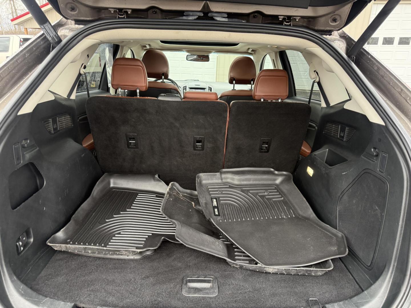 2019 Gray Ford Edge Titanium AWD (2FMPK4K99KB) with an 2.0L L4 DOHC 16V Turbo engine, Automatic transmission, located at 547 E. Main St., Orwell, OH, 44076, (440) 437-5893, 41.535435, -80.847855 - 2019 Ford Edge Titanium AWD – Top-Tier Luxury, Turbo Thrills, and Every Premium Feature You Crave! This 2019 Ford Edge Titanium AWD is loaded to the gills and ready to elevate every drive! The responsive 2.0L Turbocharged EcoBoost I4 engine teams up with a slick 8-speed automatic transmission and - Photo#27