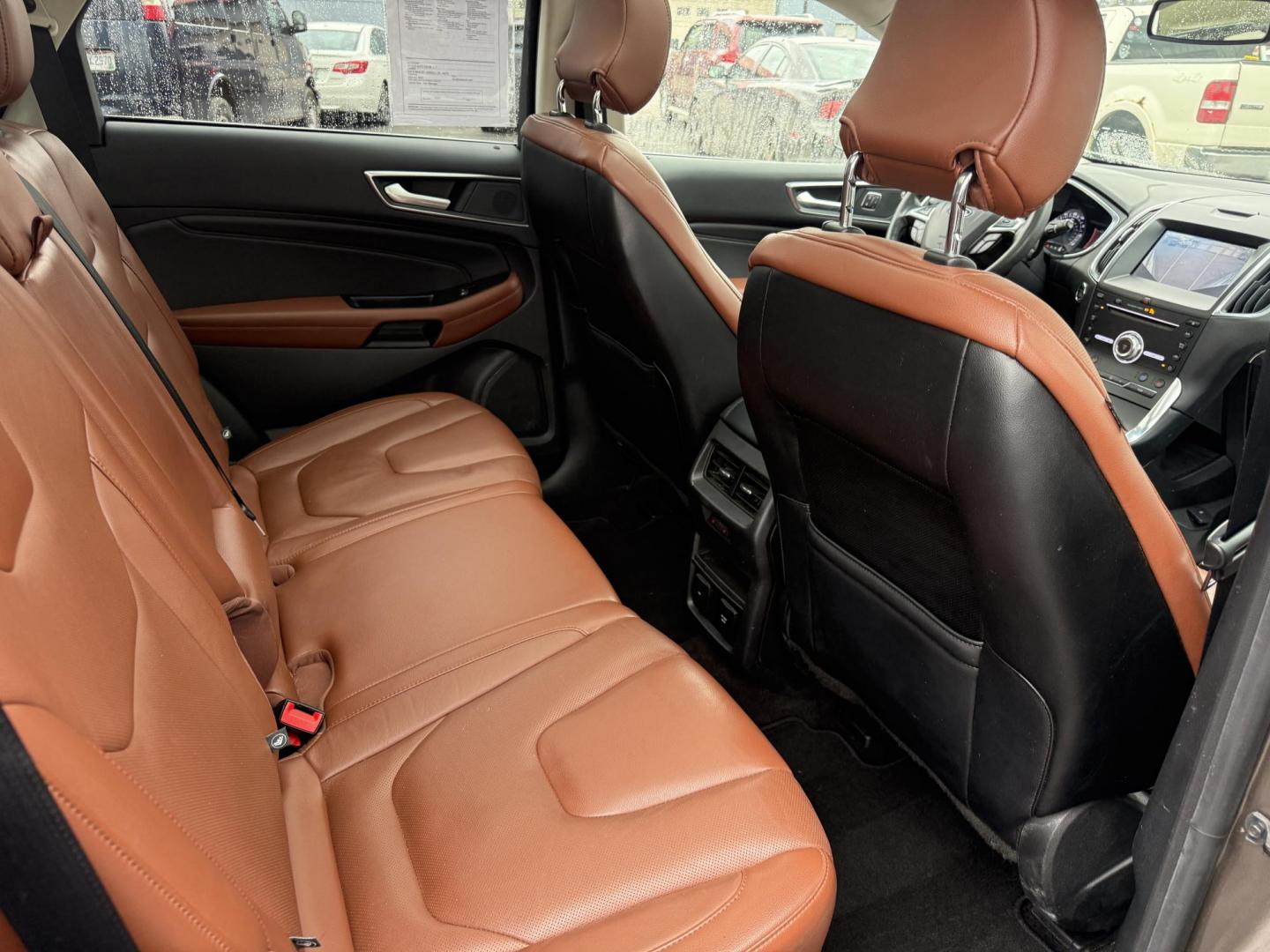 2019 Gray Ford Edge Titanium AWD (2FMPK4K99KB) with an 2.0L L4 DOHC 16V Turbo engine, Automatic transmission, located at 547 E. Main St., Orwell, OH, 44076, (440) 437-5893, 41.535435, -80.847855 - 2019 Ford Edge Titanium AWD – Top-Tier Luxury, Turbo Thrills, and Every Premium Feature You Crave! This 2019 Ford Edge Titanium AWD is loaded to the gills and ready to elevate every drive! The responsive 2.0L Turbocharged EcoBoost I4 engine teams up with a slick 8-speed automatic transmission and - Photo#47