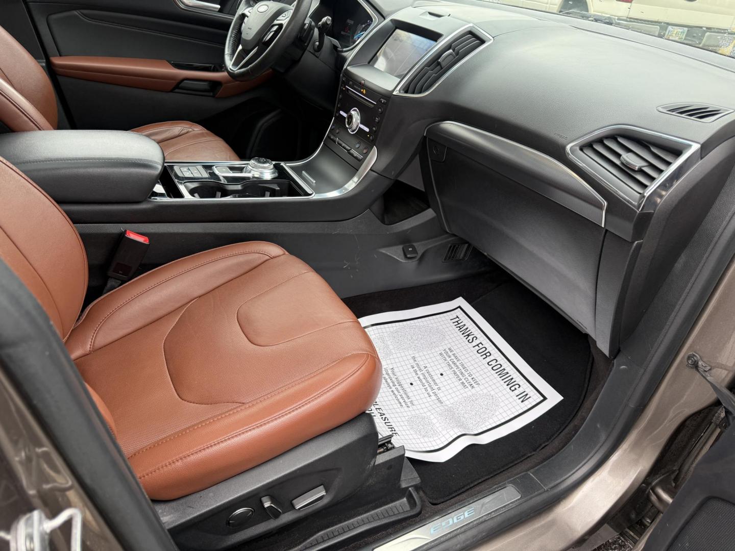 2019 Gray Ford Edge Titanium AWD (2FMPK4K99KB) with an 2.0L L4 DOHC 16V Turbo engine, Automatic transmission, located at 547 E. Main St., Orwell, OH, 44076, (440) 437-5893, 41.535435, -80.847855 - 2019 Ford Edge Titanium AWD – Top-Tier Luxury, Turbo Thrills, and Every Premium Feature You Crave! This 2019 Ford Edge Titanium AWD is loaded to the gills and ready to elevate every drive! The responsive 2.0L Turbocharged EcoBoost I4 engine teams up with a slick 8-speed automatic transmission and - Photo#49