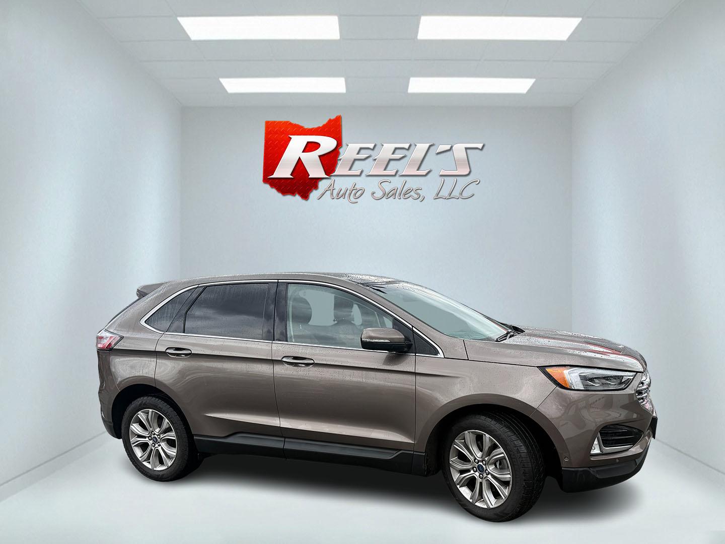 2019 Gray Ford Edge Titanium AWD (2FMPK4K99KB) with an 2.0L L4 DOHC 16V Turbo engine, Automatic transmission, located at 547 E. Main St., Orwell, OH, 44076, (440) 437-5893, 41.535435, -80.847855 - 2019 Ford Edge Titanium AWD – Top-Tier Luxury, Turbo Thrills, and Every Premium Feature You Crave! This 2019 Ford Edge Titanium AWD is loaded to the gills and ready to elevate every drive! The responsive 2.0L Turbocharged EcoBoost I4 engine teams up with a slick 8-speed automatic transmission and - Photo#3