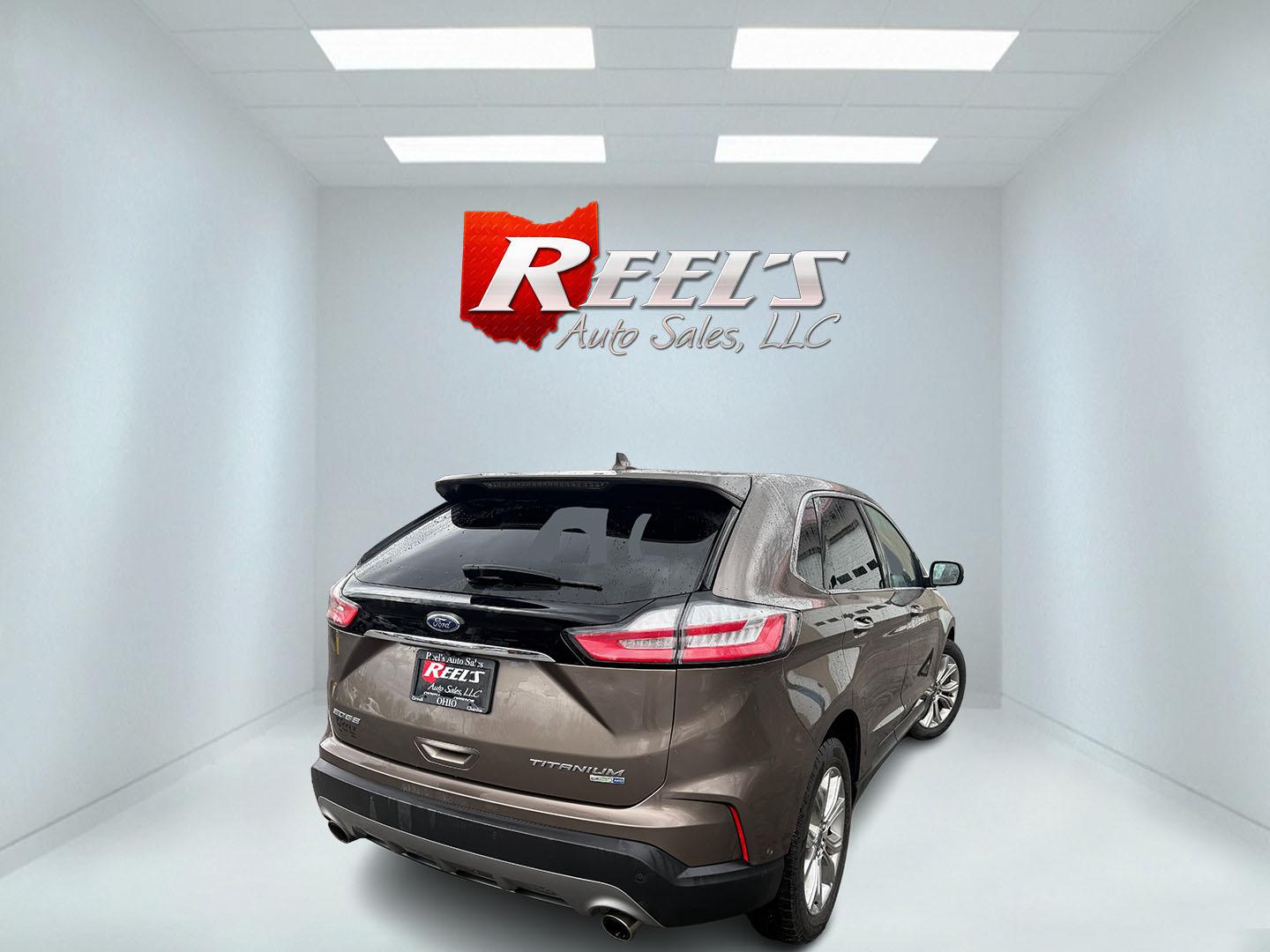 2019 Gray Ford Edge Titanium AWD (2FMPK4K99KB) with an 2.0L L4 DOHC 16V Turbo engine, Automatic transmission, located at 547 E. Main St., Orwell, OH, 44076, (440) 437-5893, 41.535435, -80.847855 - 2019 Ford Edge Titanium AWD – Top-Tier Luxury, Turbo Thrills, and Every Premium Feature You Crave! This 2019 Ford Edge Titanium AWD is loaded to the gills and ready to elevate every drive! The responsive 2.0L Turbocharged EcoBoost I4 engine teams up with a slick 8-speed automatic transmission and - Photo#32