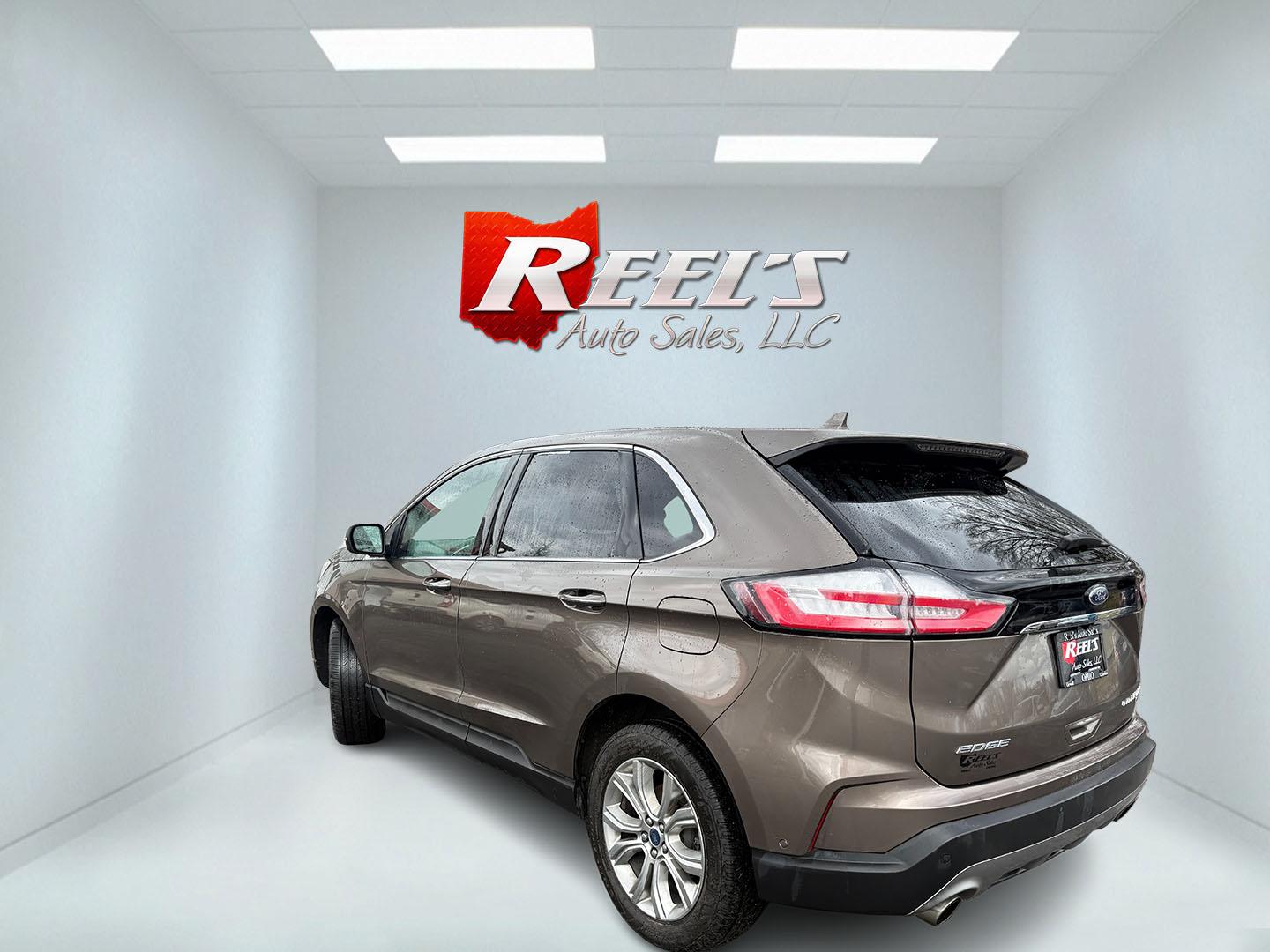 2019 Gray Ford Edge Titanium AWD (2FMPK4K99KB) with an 2.0L L4 DOHC 16V Turbo engine, Automatic transmission, located at 547 E. Main St., Orwell, OH, 44076, (440) 437-5893, 41.535435, -80.847855 - 2019 Ford Edge Titanium AWD – Top-Tier Luxury, Turbo Thrills, and Every Premium Feature You Crave! This 2019 Ford Edge Titanium AWD is loaded to the gills and ready to elevate every drive! The responsive 2.0L Turbocharged EcoBoost I4 engine teams up with a slick 8-speed automatic transmission and - Photo#34