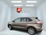 2019 Gray Ford Edge Titanium AWD (2FMPK4K99KB) with an 2.0L L4 DOHC 16V Turbo engine, Automatic transmission, located at 547 E. Main St., Orwell, OH, 44076, (440) 437-5893, 41.535435, -80.847855 - 2019 Ford Edge Titanium AWD – Top-Tier Luxury, Turbo Thrills, and Every Premium Feature You Crave! This 2019 Ford Edge Titanium AWD is loaded to the gills and ready to elevate every drive! The responsive 2.0L Turbocharged EcoBoost I4 engine teams up with a slick 8-speed automatic transmission and - Photo#35