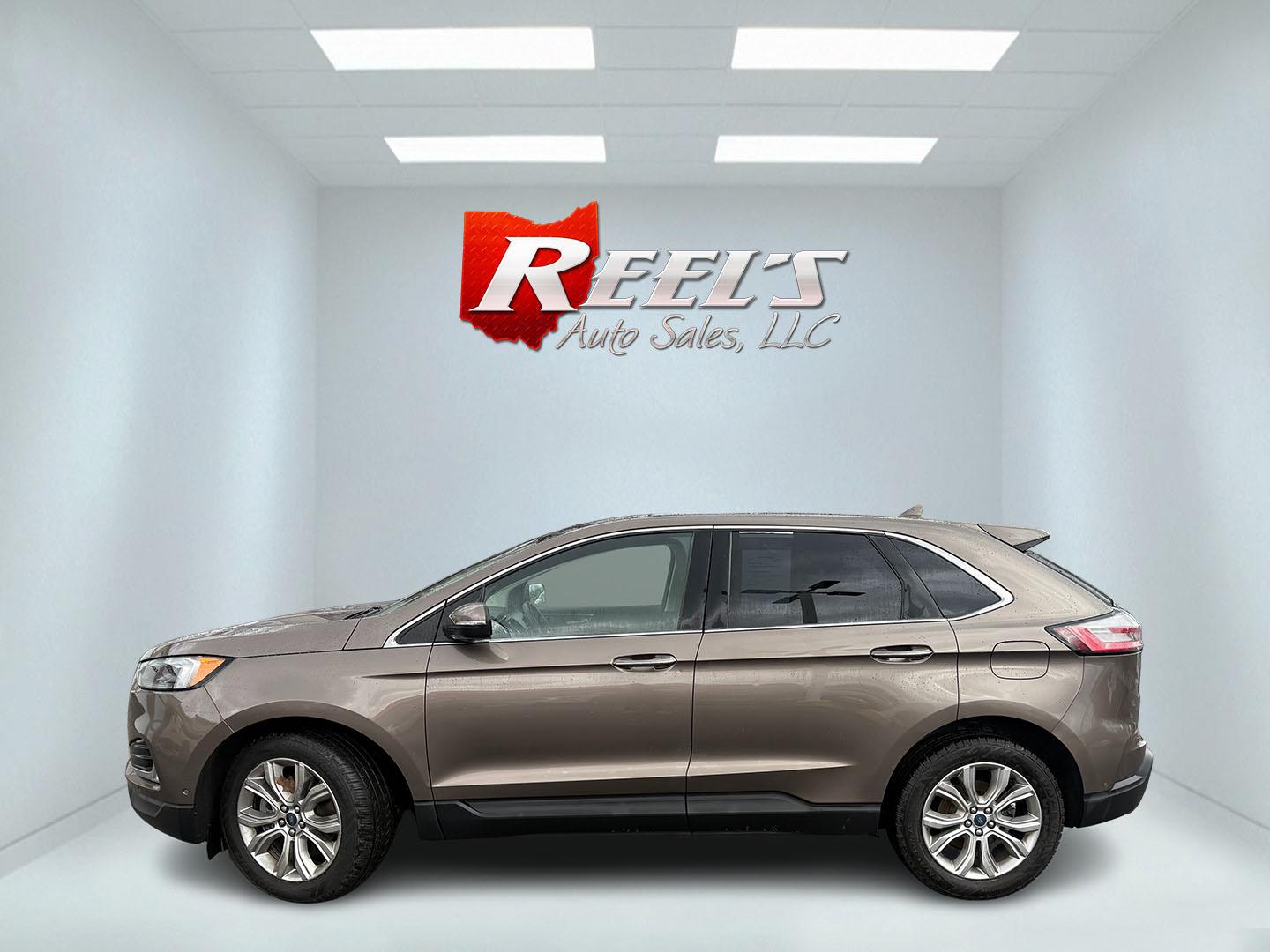 2019 Gray Ford Edge Titanium AWD (2FMPK4K99KB) with an 2.0L L4 DOHC 16V Turbo engine, Automatic transmission, located at 547 E. Main St., Orwell, OH, 44076, (440) 437-5893, 41.535435, -80.847855 - 2019 Ford Edge Titanium AWD – Top-Tier Luxury, Turbo Thrills, and Every Premium Feature You Crave! This 2019 Ford Edge Titanium AWD is loaded to the gills and ready to elevate every drive! The responsive 2.0L Turbocharged EcoBoost I4 engine teams up with a slick 8-speed automatic transmission and - Photo#37