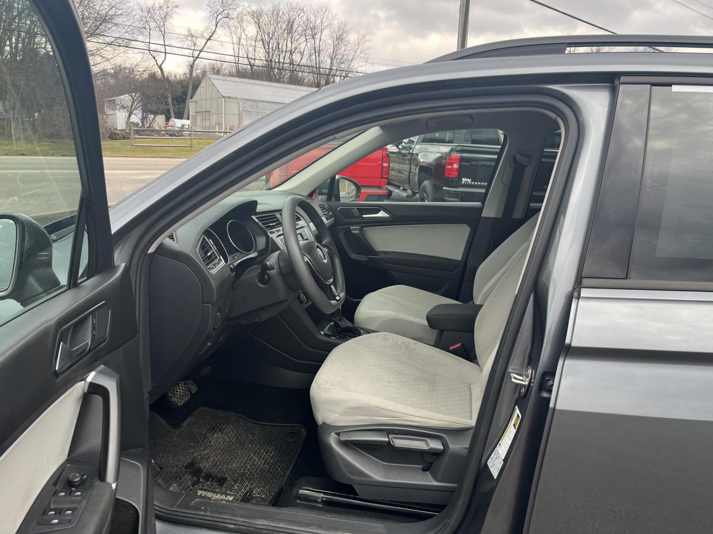 2018 Gray /Gray Volkswagen Tiguan S 4Motion AWD (3VV0B7AX1JM) with an 2.0L I4 DOHC 16V TURBO engine, Automatic transmission, located at 11115 Chardon Rd. , Chardon, OH, 44024, (440) 214-9705, 41.580246, -81.241943 - 2018 Volkswagen Tiguan S AWD – Versatile Turbo Crossover with All-Weather Grip and Modern Tech! This sharp 2018 Volkswagen Tiguan S AWD is the perfect everyday adventure machine! Powered by a responsive 2.0L Turbocharged I4 engine paired with a smooth 8-speed automatic transmission and legendary - Photo#18