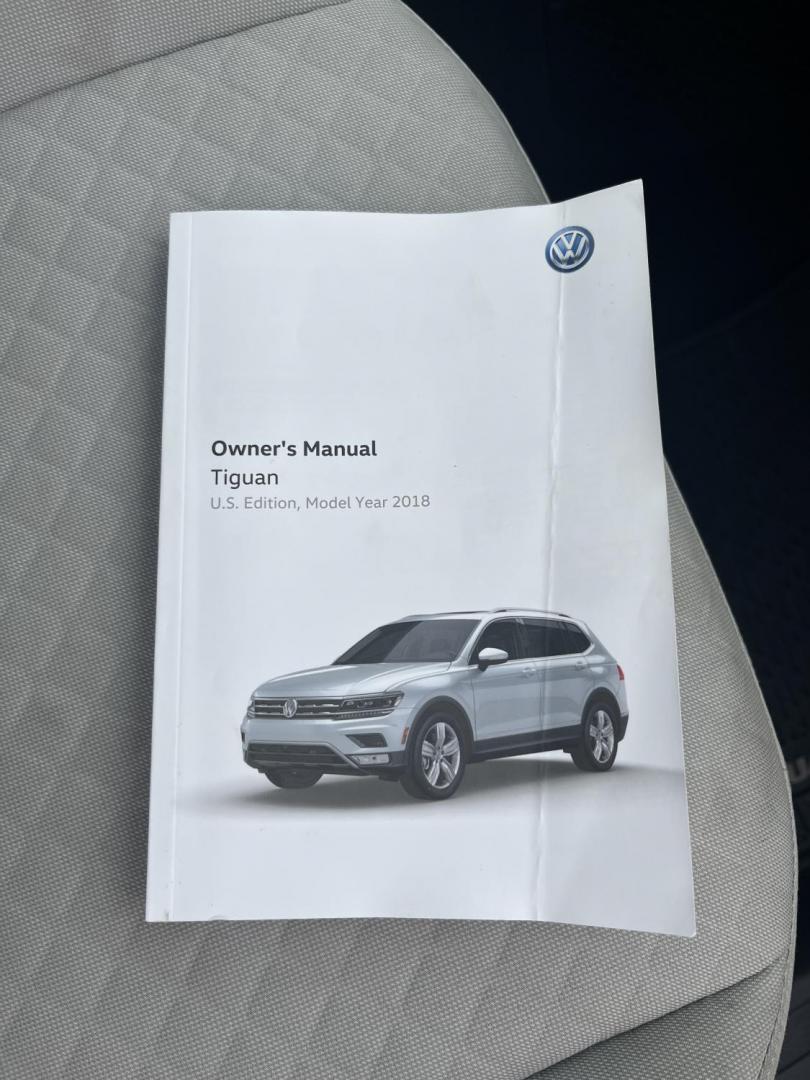 2018 Gray /Gray Volkswagen Tiguan S 4Motion AWD (3VV0B7AX1JM) with an 2.0L I4 DOHC 16V TURBO engine, Automatic transmission, located at 11115 Chardon Rd. , Chardon, OH, 44024, (440) 214-9705, 41.580246, -81.241943 - 2018 Volkswagen Tiguan S AWD – Versatile Turbo Crossover with All-Weather Grip and Modern Tech! This sharp 2018 Volkswagen Tiguan S AWD is the perfect everyday adventure machine! Powered by a responsive 2.0L Turbocharged I4 engine paired with a smooth 8-speed automatic transmission and legendary - Photo#35