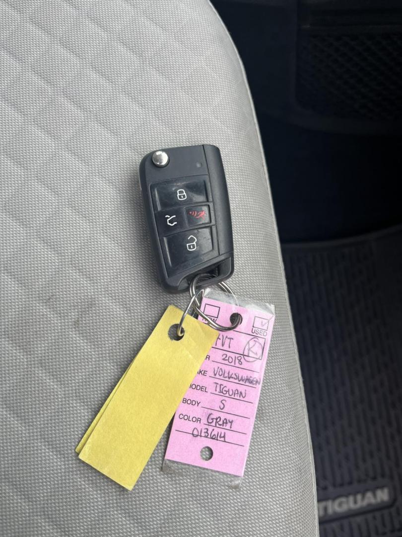 2018 Gray /Gray Volkswagen Tiguan S 4Motion AWD (3VV0B7AX1JM) with an 2.0L I4 DOHC 16V TURBO engine, Automatic transmission, located at 11115 Chardon Rd. , Chardon, OH, 44024, (440) 214-9705, 41.580246, -81.241943 - 2018 Volkswagen Tiguan S AWD – Versatile Turbo Crossover with All-Weather Grip and Modern Tech! This sharp 2018 Volkswagen Tiguan S AWD is the perfect everyday adventure machine! Powered by a responsive 2.0L Turbocharged I4 engine paired with a smooth 8-speed automatic transmission and legendary - Photo#36