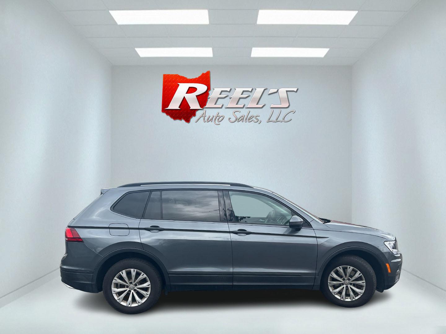 2018 Gray /Gray Volkswagen Tiguan S 4Motion AWD (3VV0B7AX1JM) with an 2.0L I4 DOHC 16V TURBO engine, Automatic transmission, located at 11115 Chardon Rd. , Chardon, OH, 44024, (440) 214-9705, 41.580246, -81.241943 - 2018 Volkswagen Tiguan S AWD – Versatile Turbo Crossover with All-Weather Grip and Modern Tech! This sharp 2018 Volkswagen Tiguan S AWD is the perfect everyday adventure machine! Powered by a responsive 2.0L Turbocharged I4 engine paired with a smooth 8-speed automatic transmission and legendary - Photo#5