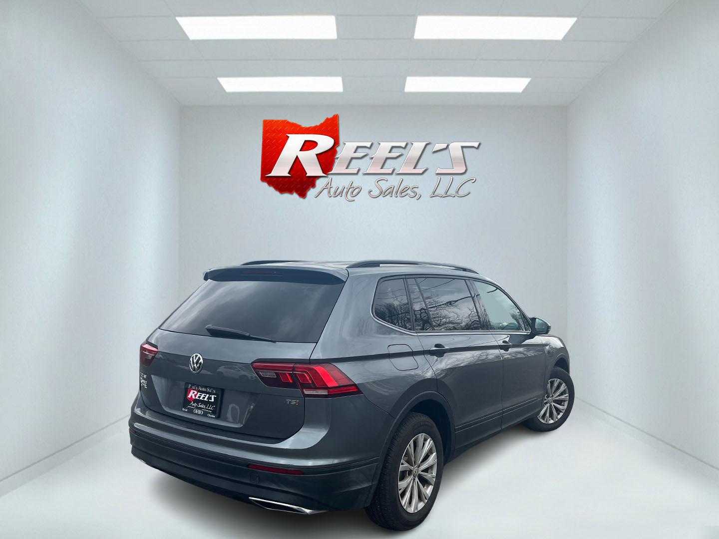 2018 Gray /Gray Volkswagen Tiguan S 4Motion AWD (3VV0B7AX1JM) with an 2.0L I4 DOHC 16V TURBO engine, Automatic transmission, located at 11115 Chardon Rd. , Chardon, OH, 44024, (440) 214-9705, 41.580246, -81.241943 - 2018 Volkswagen Tiguan S AWD – Versatile Turbo Crossover with All-Weather Grip and Modern Tech! This sharp 2018 Volkswagen Tiguan S AWD is the perfect everyday adventure machine! Powered by a responsive 2.0L Turbocharged I4 engine paired with a smooth 8-speed automatic transmission and legendary - Photo#6