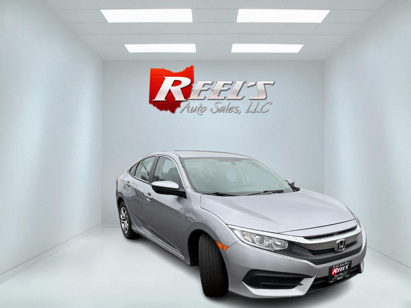 2017 Gray /Black Honda Civic LX Sedan CVT (19XFC2F52HE) with an 2.0L I4 DOHC 16V engine, Automatic transmission, located at 11115 Chardon Rd. , Chardon, OH, 44024, (440) 214-9705, 41.580246, -81.241943 - 2017 Honda Civic LX – Fuel-Sipping Legend with Modern Tech and Legendary Reliability! This sharp 2017 Honda Civic LX is the perfect daily driver that saves you money and still feels fun behind the wheel! Powered by a smooth 2.0L I4 engine with VTEC magic, paired with responsive transmission and s - Photo#2