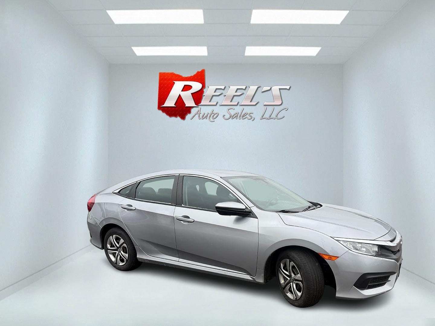 2017 Gray /Black Honda Civic LX Sedan CVT (19XFC2F52HE) with an 2.0L I4 DOHC 16V engine, Automatic transmission, located at 11115 Chardon Rd. , Chardon, OH, 44024, (440) 214-9705, 41.580246, -81.241943 - 2017 Honda Civic LX – Fuel-Sipping Legend with Modern Tech and Legendary Reliability! This sharp 2017 Honda Civic LX is the perfect daily driver that saves you money and still feels fun behind the wheel! Powered by a smooth 2.0L I4 engine with VTEC magic, paired with responsive transmission and s - Photo#3