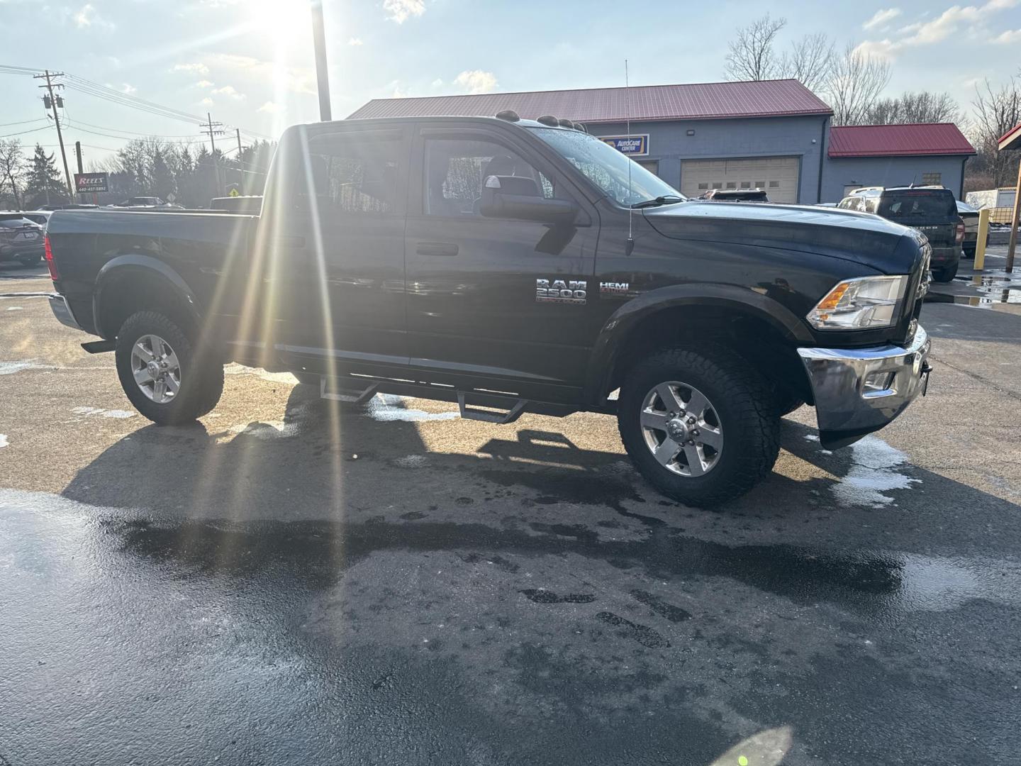 2014 Black /Gray RAM 2500 Outdoorsman Crew Cab SWB 4WD (3C6UR5DJ7EG) with an 6.4L V8 OHV 16V engine, Automatic transmission, located at 547 E. Main St., Orwell, OH, 44076, (440) 437-5893, 41.535435, -80.847855 - 2014 Ram 2500 Outdoorsman Crew Cab 4WD – Heavy-Duty Beast Built for Work, Towing, and Serious Off-Road Grit! This 2014 Ram 2500 Outdoorsman Crew Cab 4WD is a no-nonsense workhorse ready to tackle the toughest jobs! Powered by the legendary 6.4L HEMI V8 engine delivering massive torque through a s - Photo#3