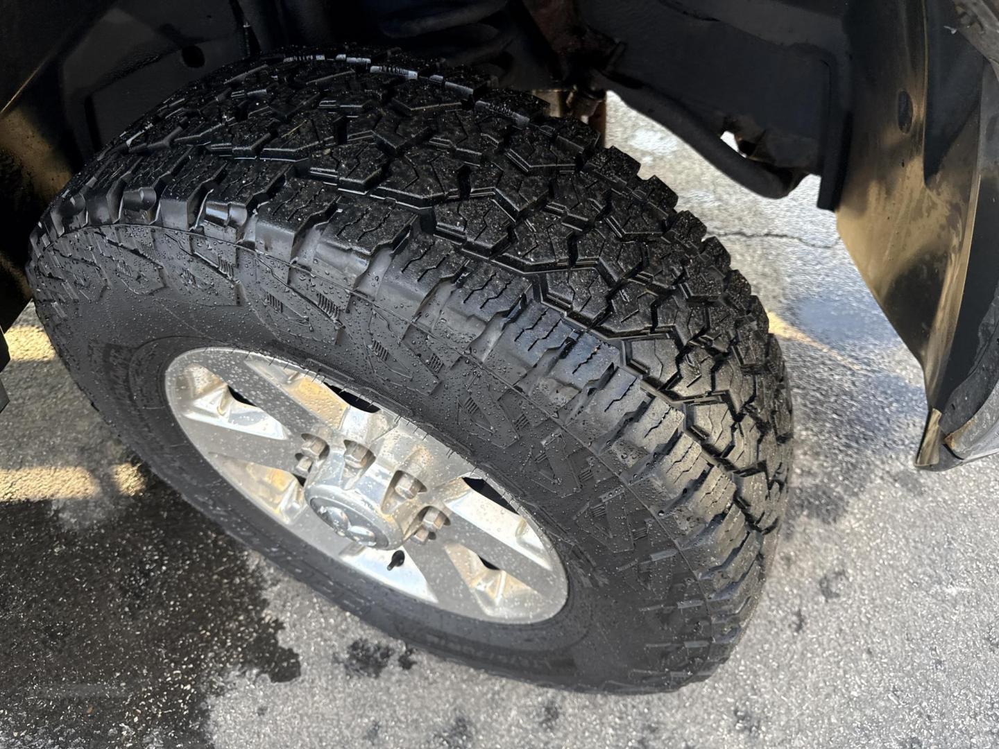 2014 Black /Gray RAM 2500 Outdoorsman Crew Cab SWB 4WD (3C6UR5DJ7EG) with an 6.4L V8 OHV 16V engine, Automatic transmission, located at 547 E. Main St., Orwell, OH, 44076, (440) 437-5893, 41.535435, -80.847855 - 2014 Ram 2500 Outdoorsman Crew Cab 4WD – Heavy-Duty Beast Built for Work, Towing, and Serious Off-Road Grit! This 2014 Ram 2500 Outdoorsman Crew Cab 4WD is a no-nonsense workhorse ready to tackle the toughest jobs! Powered by the legendary 6.4L HEMI V8 engine delivering massive torque through a s - Photo#4