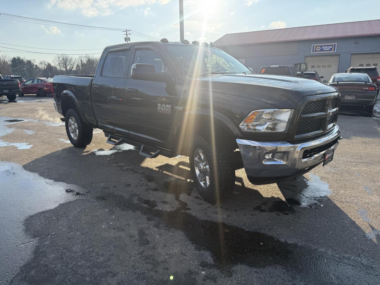 2014 Black /Gray RAM 2500 Outdoorsman Crew Cab SWB 4WD (3C6UR5DJ7EG) with an 6.4L V8 OHV 16V engine, Automatic transmission, located at 547 E. Main St., Orwell, OH, 44076, (440) 437-5893, 41.535435, -80.847855 - 2014 Ram 2500 Outdoorsman Crew Cab 4WD – Heavy-Duty Beast Built for Work, Towing, and Serious Off-Road Grit! This 2014 Ram 2500 Outdoorsman Crew Cab 4WD is a no-nonsense workhorse ready to tackle the toughest jobs! Powered by the legendary 6.4L HEMI V8 engine delivering massive torque through a s - Photo#2