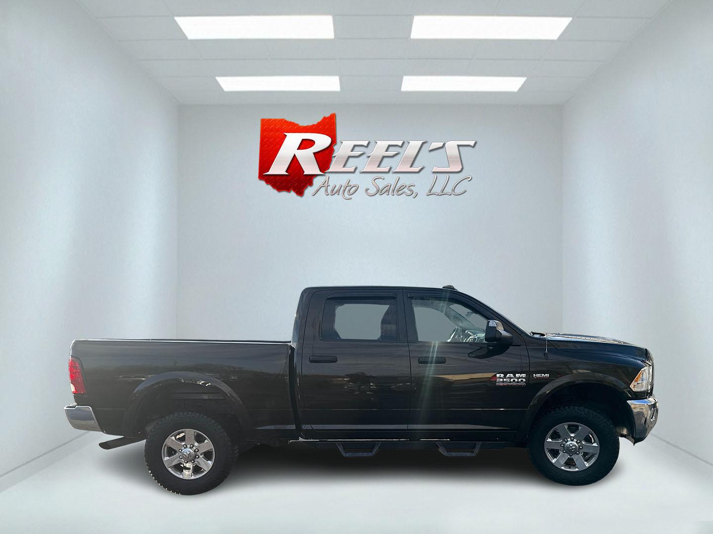 2014 Black /Gray RAM 2500 Outdoorsman Crew Cab SWB 4WD (3C6UR5DJ7EG) with an 6.4L V8 OHV 16V engine, Automatic transmission, located at 547 E. Main St., Orwell, OH, 44076, (440) 437-5893, 41.535435, -80.847855 - 2014 Ram 2500 Outdoorsman Crew Cab 4WD – Heavy-Duty Beast Built for Work, Towing, and Serious Off-Road Grit! This 2014 Ram 2500 Outdoorsman Crew Cab 4WD is a no-nonsense workhorse ready to tackle the toughest jobs! Powered by the legendary 6.4L HEMI V8 engine delivering massive torque through a s - Photo#31
