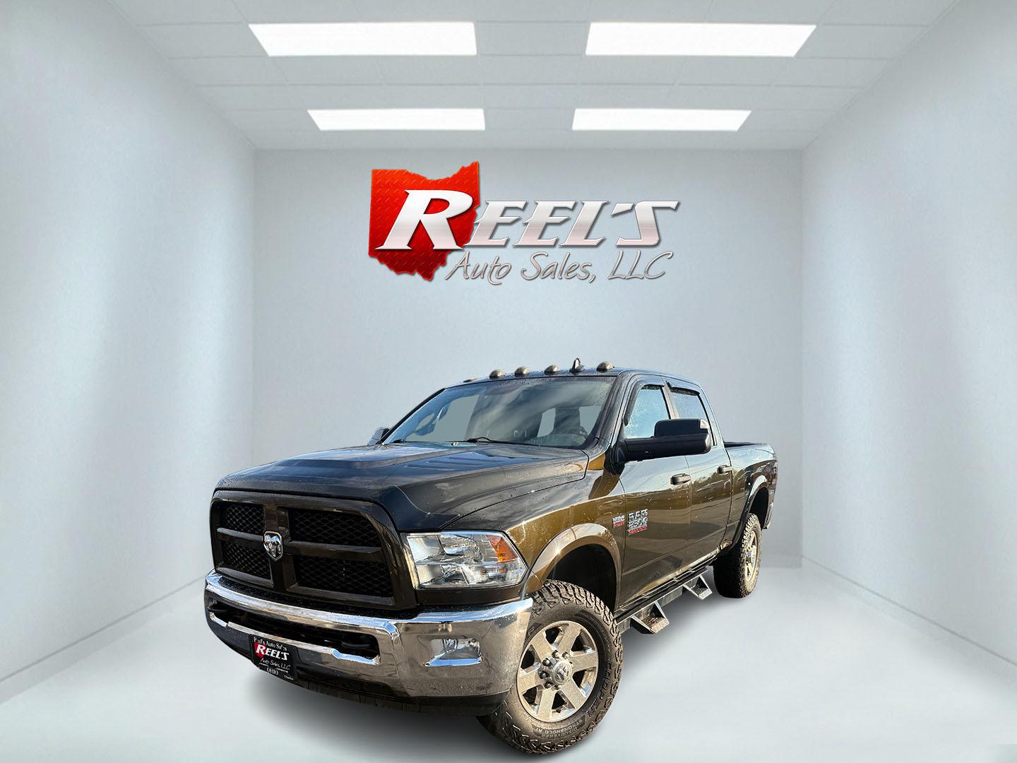 2014 Black /Gray RAM 2500 Outdoorsman Crew Cab SWB 4WD (3C6UR5DJ7EG) with an 6.4L V8 OHV 16V engine, Automatic transmission, located at 547 E. Main St., Orwell, OH, 44076, (440) 437-5893, 41.535435, -80.847855 - 2014 Ram 2500 Outdoorsman Crew Cab 4WD – Heavy-Duty Beast Built for Work, Towing, and Serious Off-Road Grit! This 2014 Ram 2500 Outdoorsman Crew Cab 4WD is a no-nonsense workhorse ready to tackle the toughest jobs! Powered by the legendary 6.4L HEMI V8 engine delivering massive torque through a s - Photo#0