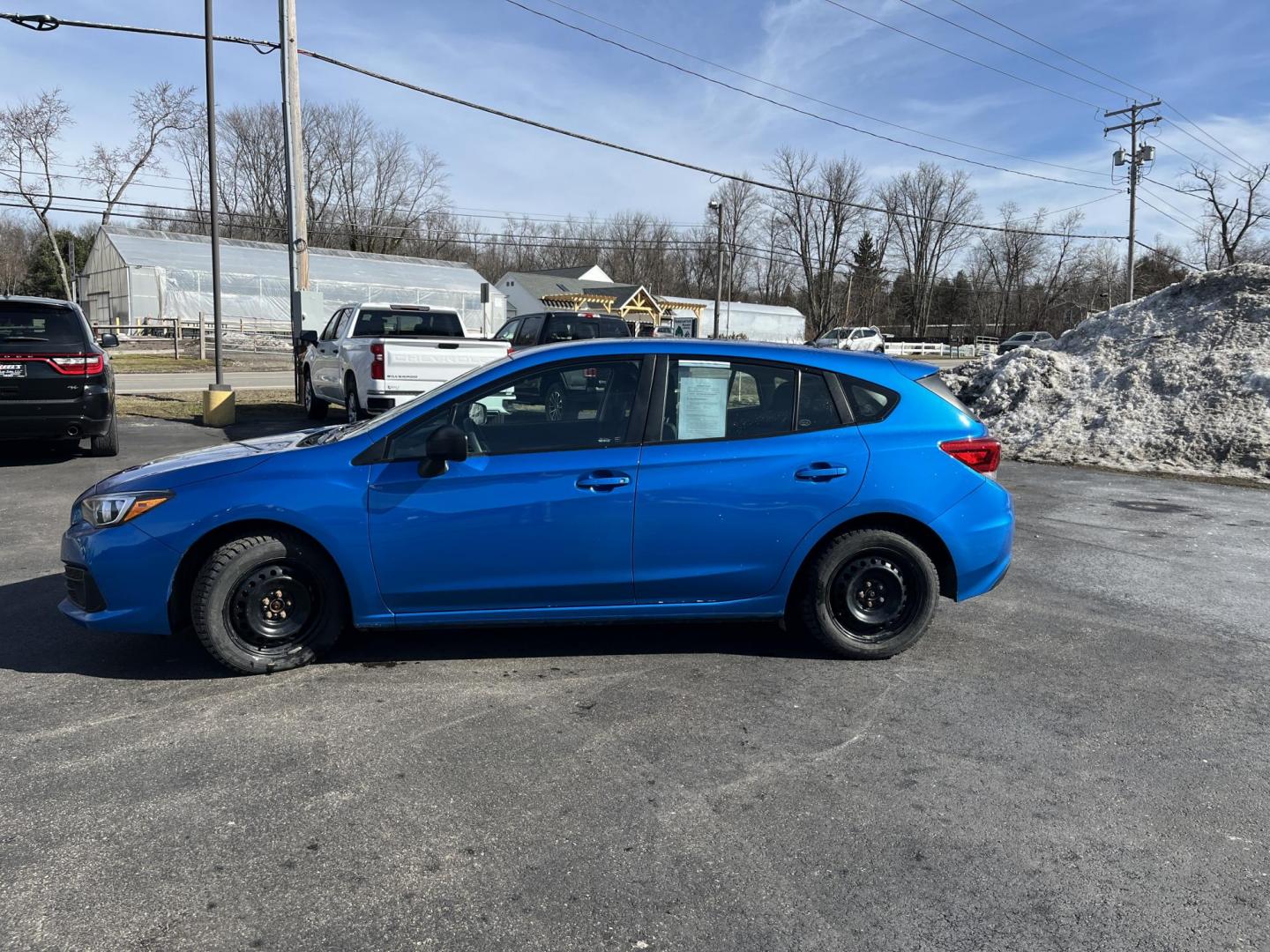 2022 Blue /Black Subaru Impreza 2.0i (4S3GTAB69N3) with an 2.0L H4 DOHC 16V engine, Automatic transmission, located at 11115 Chardon Rd. , Chardon, OH, 44024, (440) 214-9705, 41.580246, -81.241943 - 2022 Subaru Impreza Hatch 2.0i – Reliable AWD Hatchback with Great Efficiency and Loaded Safety Features! This sharp 2022 Subaru Impreza Hatch 2.0i is the perfect all-weather daily driver that combines Subaru toughness with smart efficiency! Powered by a dependable 2.0L H4 engine paired with the - Photo#11