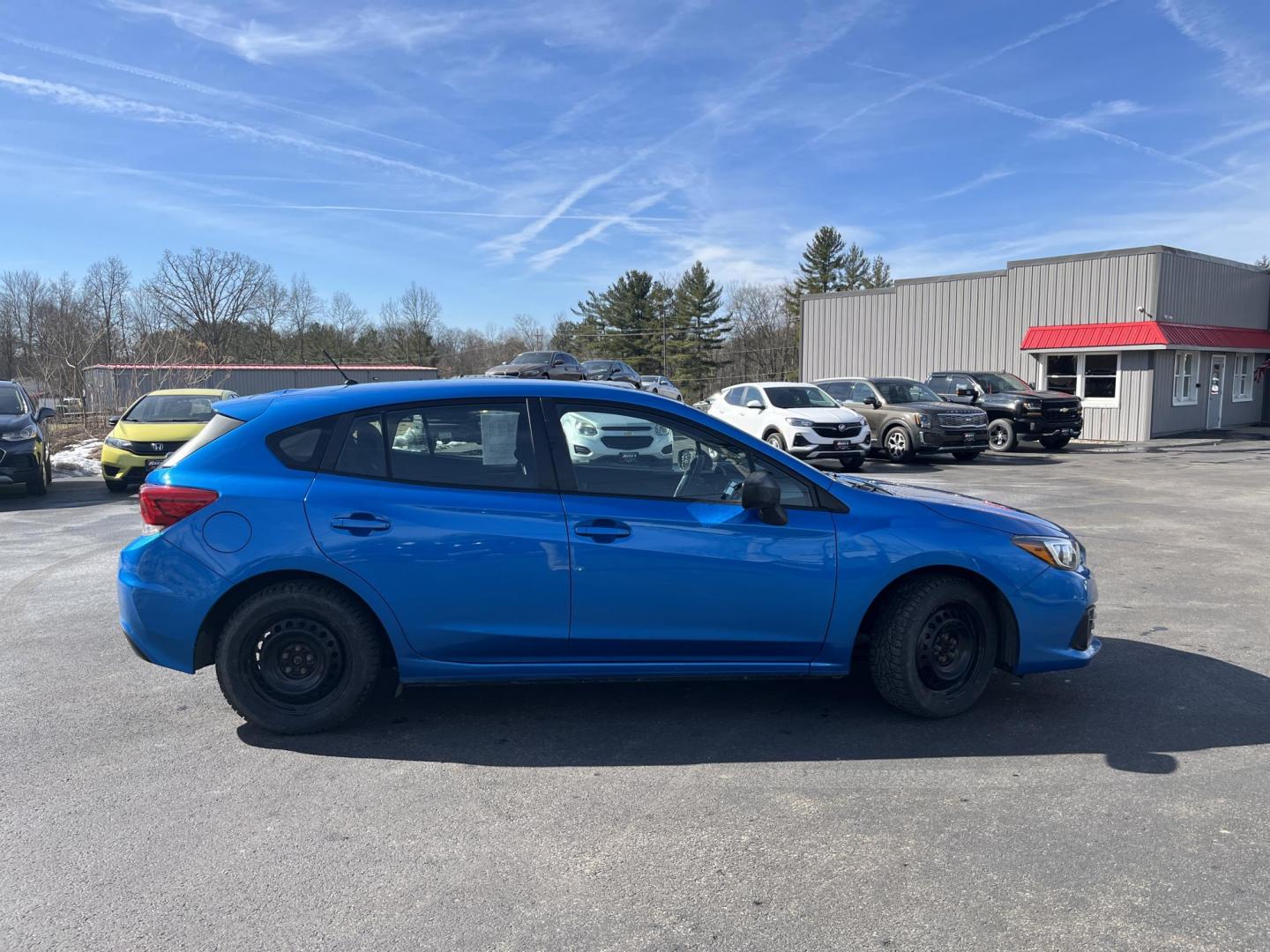 2022 Blue /Black Subaru Impreza 2.0i (4S3GTAB69N3) with an 2.0L H4 DOHC 16V engine, Automatic transmission, located at 11115 Chardon Rd. , Chardon, OH, 44024, (440) 214-9705, 41.580246, -81.241943 - 2022 Subaru Impreza Hatch 2.0i – Reliable AWD Hatchback with Great Efficiency and Loaded Safety Features! This sharp 2022 Subaru Impreza Hatch 2.0i is the perfect all-weather daily driver that combines Subaru toughness with smart efficiency! Powered by a dependable 2.0L H4 engine paired with the - Photo#5