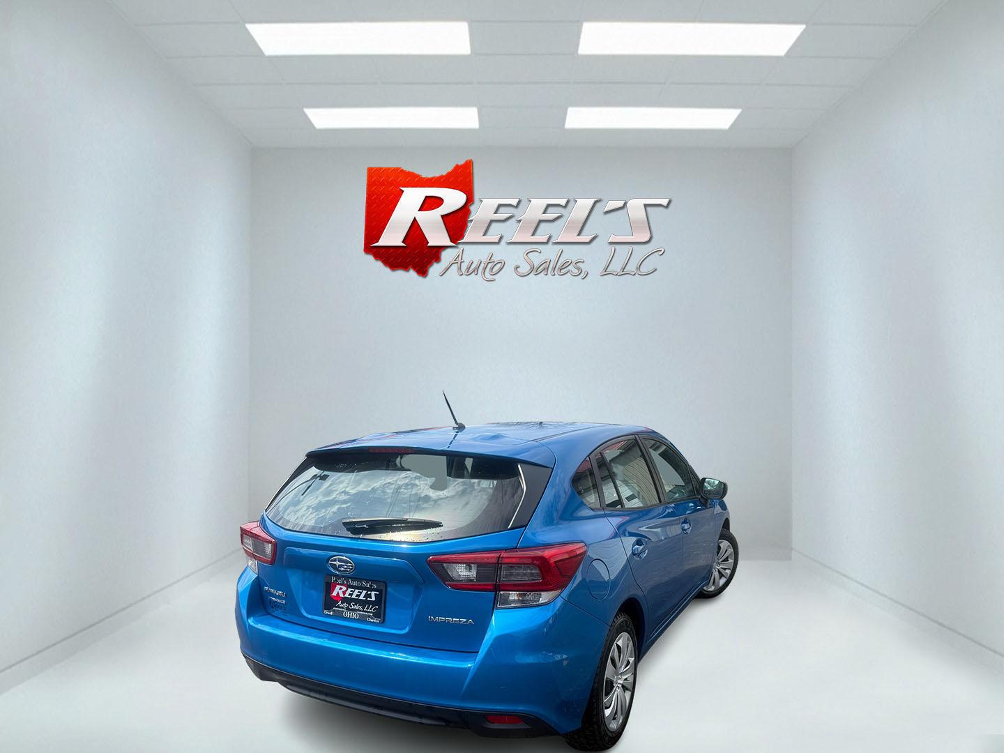 2022 Blue /Black Subaru Impreza 2.0i (4S3GTAB69N3) with an 2.0L H4 DOHC 16V engine, Automatic transmission, located at 547 E. Main St., Orwell, OH, 44076, (440) 437-5893, 41.535435, -80.847855 - 2022 Subaru Impreza Hatch 2.0i – Reliable AWD Hatchback with Great Efficiency and Loaded Safety Features! This sharp 2022 Subaru Impreza Hatch 2.0i is the perfect all-weather daily driver that combines Subaru toughness with smart efficiency! Powered by a dependable 2.0L H4 engine paired with the - Photo#4