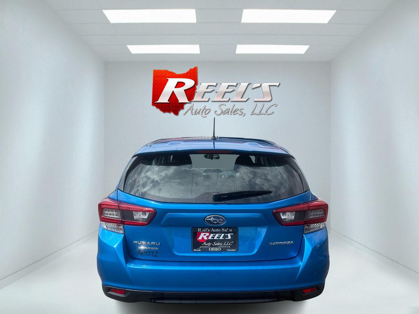 2022 Blue /Black Subaru Impreza 2.0i (4S3GTAB69N3) with an 2.0L H4 DOHC 16V engine, Automatic transmission, located at 547 E. Main St., Orwell, OH, 44076, (440) 437-5893, 41.535435, -80.847855 - 2022 Subaru Impreza Hatch 2.0i – Reliable AWD Hatchback with Great Efficiency and Loaded Safety Features! This sharp 2022 Subaru Impreza Hatch 2.0i is the perfect all-weather daily driver that combines Subaru toughness with smart efficiency! Powered by a dependable 2.0L H4 engine paired with the - Photo#5