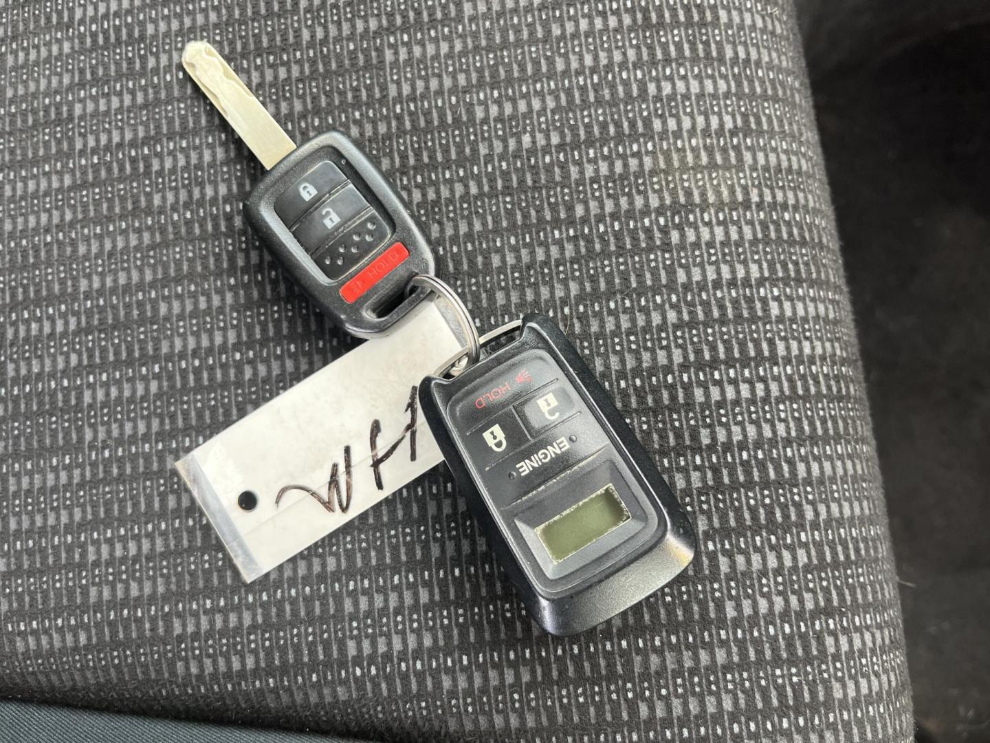 2015 Yellow /Black Honda Fit LX (3HGGK5H56FM) with an 1.5L I4 DOHC 16V engine, Automatic transmission, located at 11115 Chardon Rd. , Chardon, OH, 44024, (440) 214-9705, 41.580246, -81.241943 - 2015 Honda Fit LX – Super-Efficient Hatchback with Fun Personality and Eye-Catching Style! This zippy 2015 Honda Fit LX is the ultimate smart buy for anyone wanting maximum fun, space, and fuel savings in a compact package! Powered by Honda’s reliable 1.5L I4 Earth Dreams engine, it delivers pe - Photo#31