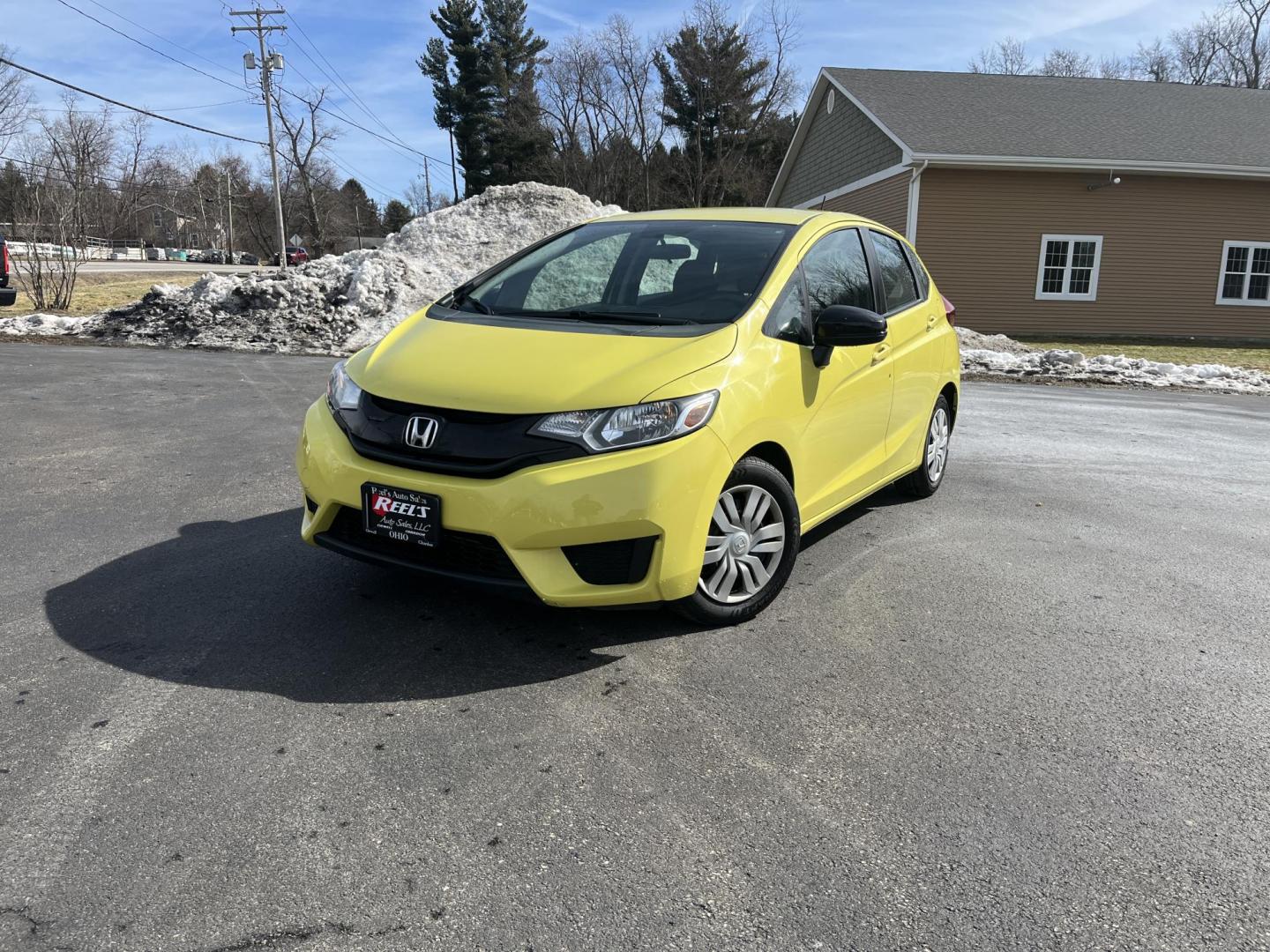 2015 Yellow /Black Honda Fit LX (3HGGK5H56FM) with an 1.5L I4 DOHC 16V engine, Automatic transmission, located at 11115 Chardon Rd. , Chardon, OH, 44024, (440) 214-9705, 41.580246, -81.241943 - 2015 Honda Fit LX – Super-Efficient Hatchback with Fun Personality and Eye-Catching Style! This zippy 2015 Honda Fit LX is the ultimate smart buy for anyone wanting maximum fun, space, and fuel savings in a compact package! Powered by Honda’s reliable 1.5L I4 Earth Dreams engine, it delivers pe - Photo#0