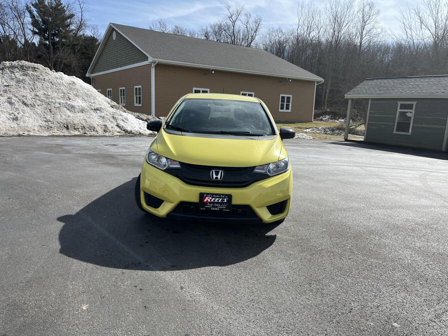 2015 Yellow /Black Honda Fit LX (3HGGK5H56FM) with an 1.5L I4 DOHC 16V engine, Automatic transmission, located at 11115 Chardon Rd. , Chardon, OH, 44024, (440) 214-9705, 41.580246, -81.241943 - 2015 Honda Fit LX – Super-Efficient Hatchback with Fun Personality and Eye-Catching Style! This zippy 2015 Honda Fit LX is the ultimate smart buy for anyone wanting maximum fun, space, and fuel savings in a compact package! Powered by Honda’s reliable 1.5L I4 Earth Dreams engine, it delivers pe - Photo#1