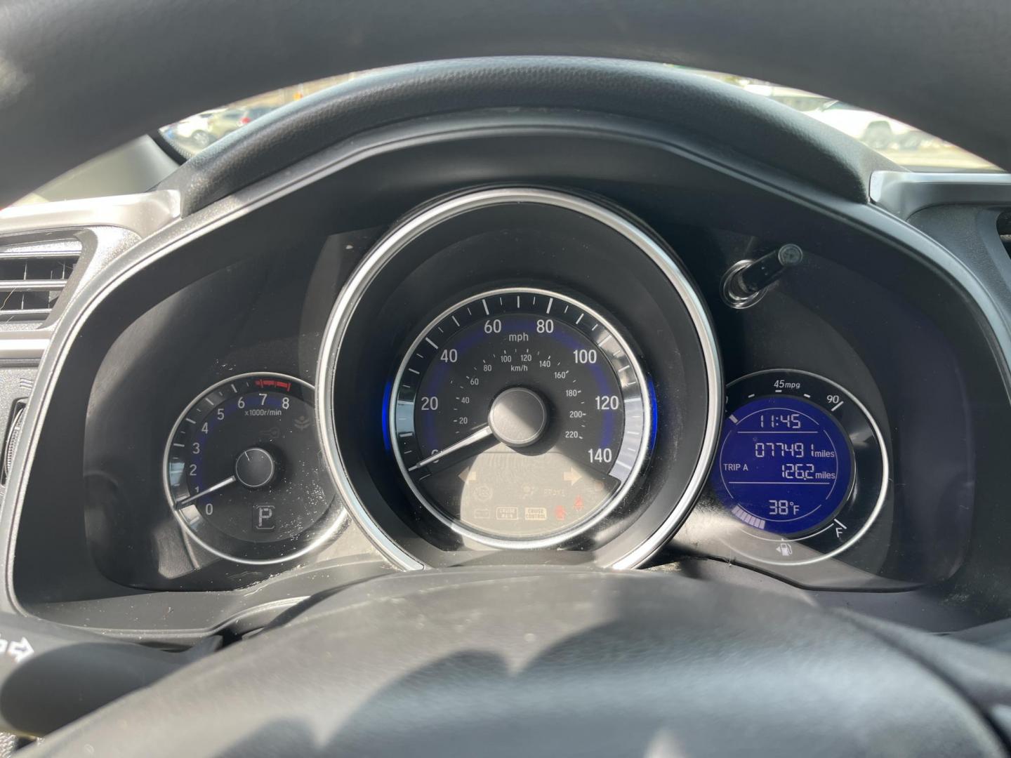 2015 Yellow /Black Honda Fit LX (3HGGK5H56FM) with an 1.5L I4 DOHC 16V engine, Automatic transmission, located at 11115 Chardon Rd. , Chardon, OH, 44024, (440) 214-9705, 41.580246, -81.241943 - 2015 Honda Fit LX – Super-Efficient Hatchback with Fun Personality and Eye-Catching Style! This zippy 2015 Honda Fit LX is the ultimate smart buy for anyone wanting maximum fun, space, and fuel savings in a compact package! Powered by Honda’s reliable 1.5L I4 Earth Dreams engine, it delivers pe - Photo#20