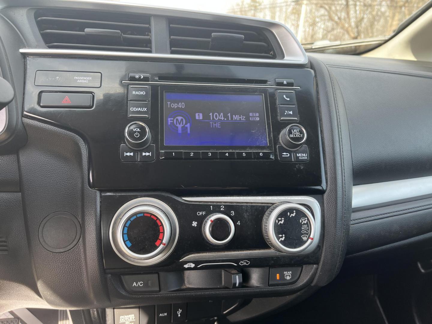 2015 Yellow /Black Honda Fit LX (3HGGK5H56FM) with an 1.5L I4 DOHC 16V engine, Automatic transmission, located at 11115 Chardon Rd. , Chardon, OH, 44024, (440) 214-9705, 41.580246, -81.241943 - 2015 Honda Fit LX – Super-Efficient Hatchback with Fun Personality and Eye-Catching Style! This zippy 2015 Honda Fit LX is the ultimate smart buy for anyone wanting maximum fun, space, and fuel savings in a compact package! Powered by Honda’s reliable 1.5L I4 Earth Dreams engine, it delivers pe - Photo#21