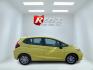 2015 Yellow /Black Honda Fit LX (3HGGK5H56FM) with an 1.5L I4 DOHC 16V engine, Automatic transmission, located at 11115 Chardon Rd. , Chardon, OH, 44024, (440) 214-9705, 41.580246, -81.241943 - 2015 Honda Fit LX – Super-Efficient Hatchback with Fun Personality and Eye-Catching Style! This zippy 2015 Honda Fit LX is the ultimate smart buy for anyone wanting maximum fun, space, and fuel savings in a compact package! Powered by Honda’s reliable 1.5L I4 Earth Dreams engine, it delivers pe - Photo#4