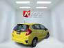 2015 Yellow /Black Honda Fit LX (3HGGK5H56FM) with an 1.5L I4 DOHC 16V engine, Automatic transmission, located at 11115 Chardon Rd. , Chardon, OH, 44024, (440) 214-9705, 41.580246, -81.241943 - 2015 Honda Fit LX – Super-Efficient Hatchback with Fun Personality and Eye-Catching Style! This zippy 2015 Honda Fit LX is the ultimate smart buy for anyone wanting maximum fun, space, and fuel savings in a compact package! Powered by Honda’s reliable 1.5L I4 Earth Dreams engine, it delivers pe - Photo#5