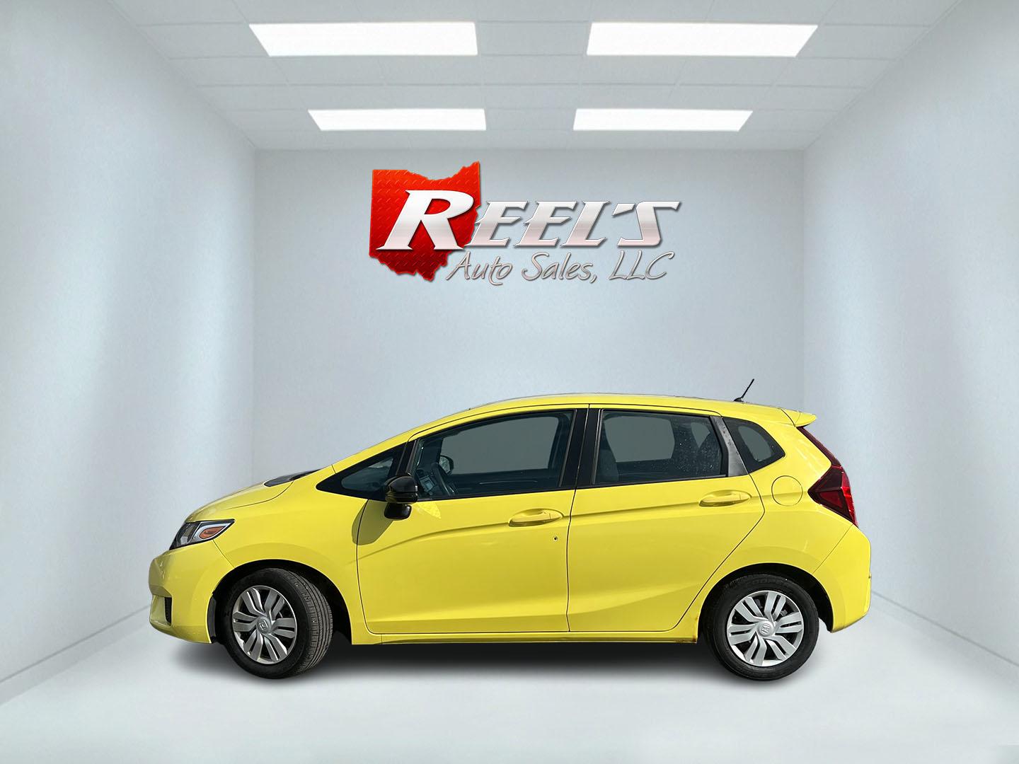 2015 Yellow /Black Honda Fit LX (3HGGK5H56FM) with an 1.5L I4 DOHC 16V engine, Automatic transmission, located at 11115 Chardon Rd. , Chardon, OH, 44024, (440) 214-9705, 41.580246, -81.241943 - 2015 Honda Fit LX – Super-Efficient Hatchback with Fun Personality and Eye-Catching Style! This zippy 2015 Honda Fit LX is the ultimate smart buy for anyone wanting maximum fun, space, and fuel savings in a compact package! Powered by Honda’s reliable 1.5L I4 Earth Dreams engine, it delivers pe - Photo#10