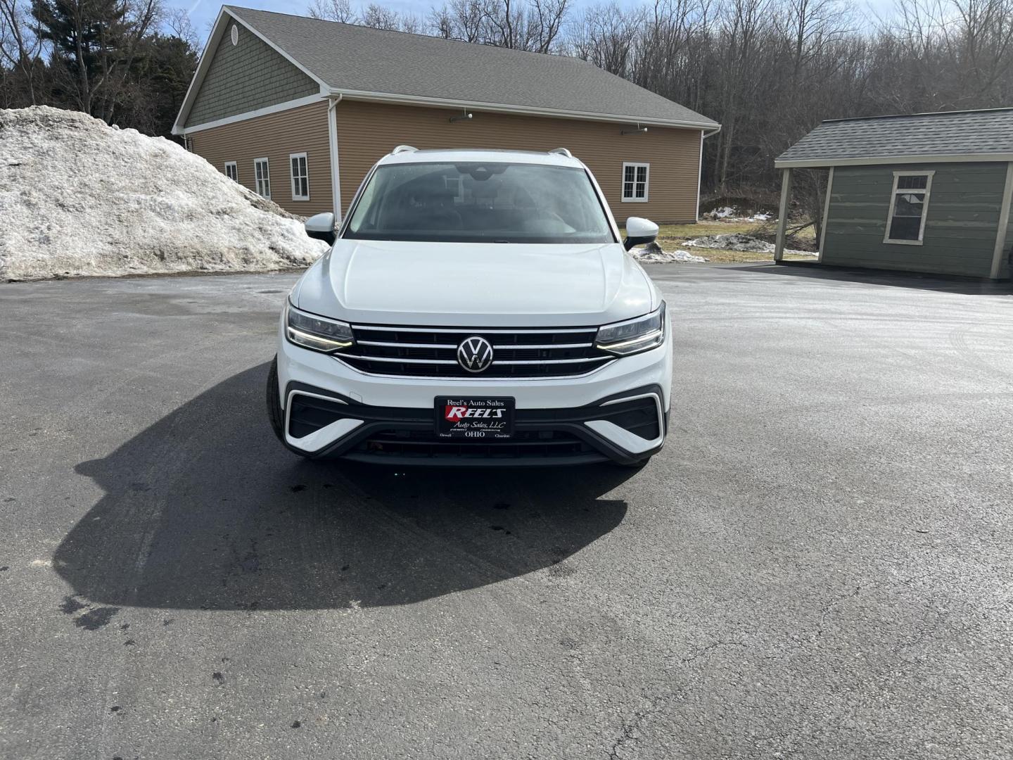 2022 White /Black Volkswagen Tiguan SE 4Motion (3VV2B7AX6NM) with an 2.0L I4 DOHC 16V Turbo engine, Automatic transmission, located at 11115 Chardon Rd. , Chardon, OH, 44024, (440) 214-9705, 41.580246, -81.241943 - 2022 Volkswagen Tiguan SE AWD – Premium Comfort, All-Weather Confidence, and Loaded with Advanced Safety & Tech! This 2022 Volkswagen Tiguan SE AWD is the perfect upscale crossover that’s ready for family adventures, daily commutes, or weekend getaways! Powered by a responsive 2.0L Turbocharged - Photo#1