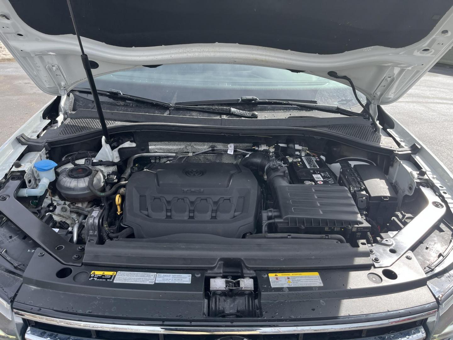 2022 White /Black Volkswagen Tiguan SE 4Motion (3VV2B7AX6NM) with an 2.0L I4 DOHC 16V Turbo engine, Automatic transmission, located at 11115 Chardon Rd. , Chardon, OH, 44024, (440) 214-9705, 41.580246, -81.241943 - 2022 Volkswagen Tiguan SE AWD – Premium Comfort, All-Weather Confidence, and Loaded with Advanced Safety & Tech! This 2022 Volkswagen Tiguan SE AWD is the perfect upscale crossover that’s ready for family adventures, daily commutes, or weekend getaways! Powered by a responsive 2.0L Turbocharged - Photo#13