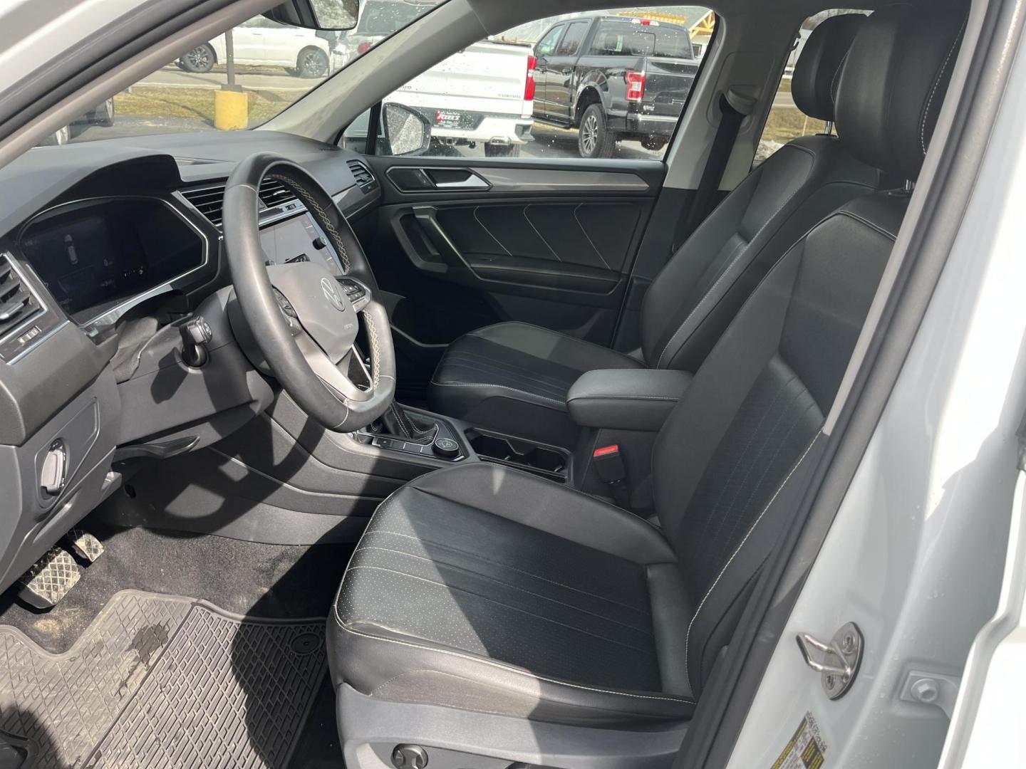 2022 White /Black Volkswagen Tiguan SE 4Motion (3VV2B7AX6NM) with an 2.0L I4 DOHC 16V Turbo engine, Automatic transmission, located at 11115 Chardon Rd. , Chardon, OH, 44024, (440) 214-9705, 41.580246, -81.241943 - 2022 Volkswagen Tiguan SE AWD – Premium Comfort, All-Weather Confidence, and Loaded with Advanced Safety & Tech! This 2022 Volkswagen Tiguan SE AWD is the perfect upscale crossover that’s ready for family adventures, daily commutes, or weekend getaways! Powered by a responsive 2.0L Turbocharged - Photo#22