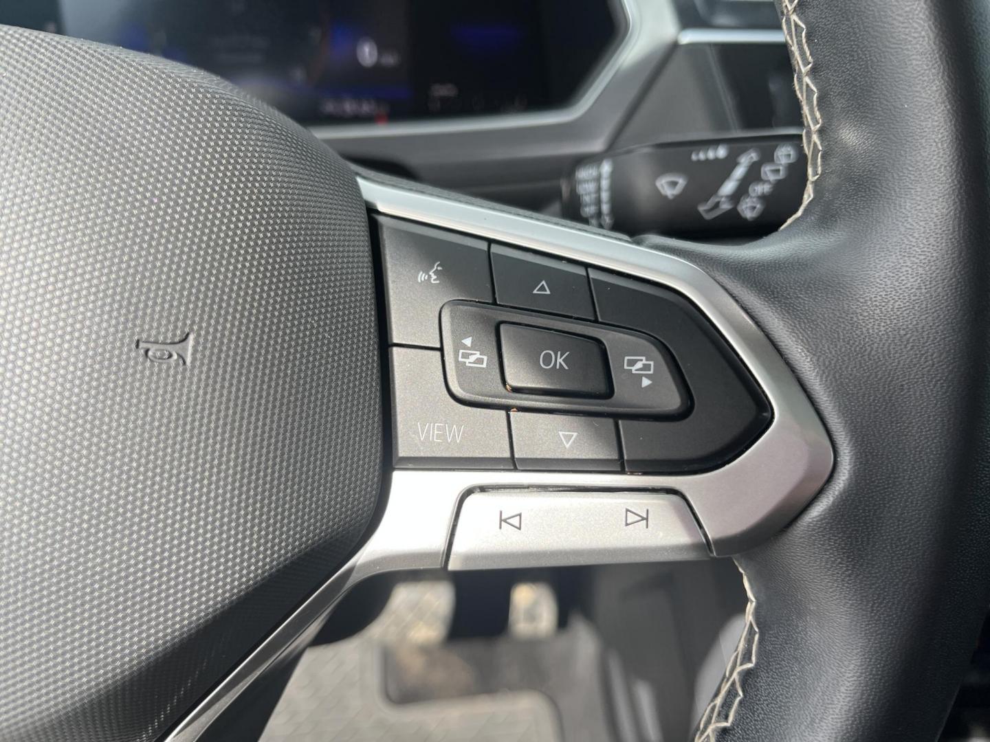 2022 White /Black Volkswagen Tiguan SE 4Motion (3VV2B7AX6NM) with an 2.0L I4 DOHC 16V Turbo engine, Automatic transmission, located at 11115 Chardon Rd. , Chardon, OH, 44024, (440) 214-9705, 41.580246, -81.241943 - 2022 Volkswagen Tiguan SE AWD – Premium Comfort, All-Weather Confidence, and Loaded with Advanced Safety & Tech! This 2022 Volkswagen Tiguan SE AWD is the perfect upscale crossover that’s ready for family adventures, daily commutes, or weekend getaways! Powered by a responsive 2.0L Turbocharged - Photo#27