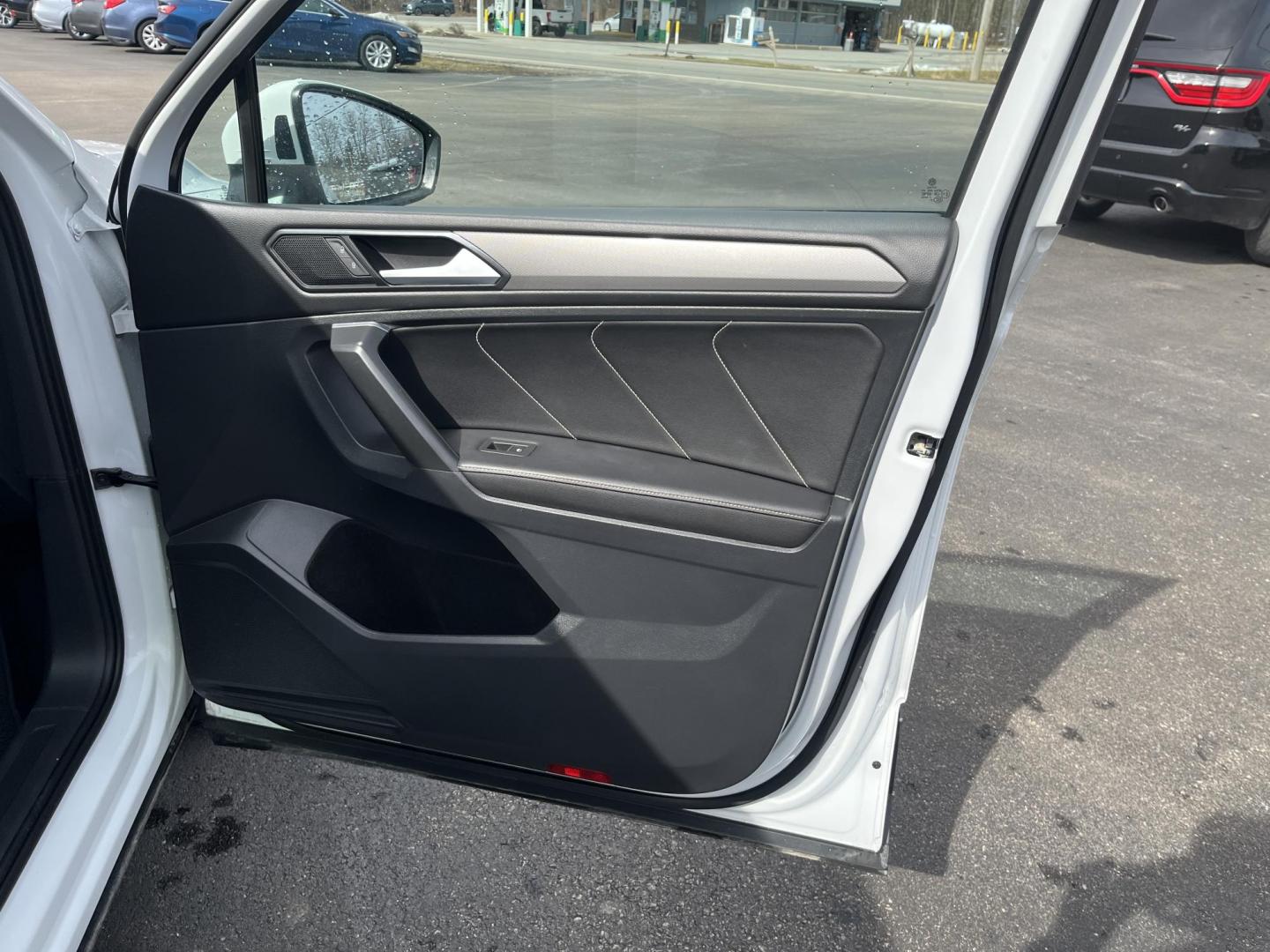 2022 White /Black Volkswagen Tiguan SE 4Motion (3VV2B7AX6NM) with an 2.0L I4 DOHC 16V Turbo engine, Automatic transmission, located at 11115 Chardon Rd. , Chardon, OH, 44024, (440) 214-9705, 41.580246, -81.241943 - 2022 Volkswagen Tiguan SE AWD – Premium Comfort, All-Weather Confidence, and Loaded with Advanced Safety & Tech! This 2022 Volkswagen Tiguan SE AWD is the perfect upscale crossover that’s ready for family adventures, daily commutes, or weekend getaways! Powered by a responsive 2.0L Turbocharged - Photo#42