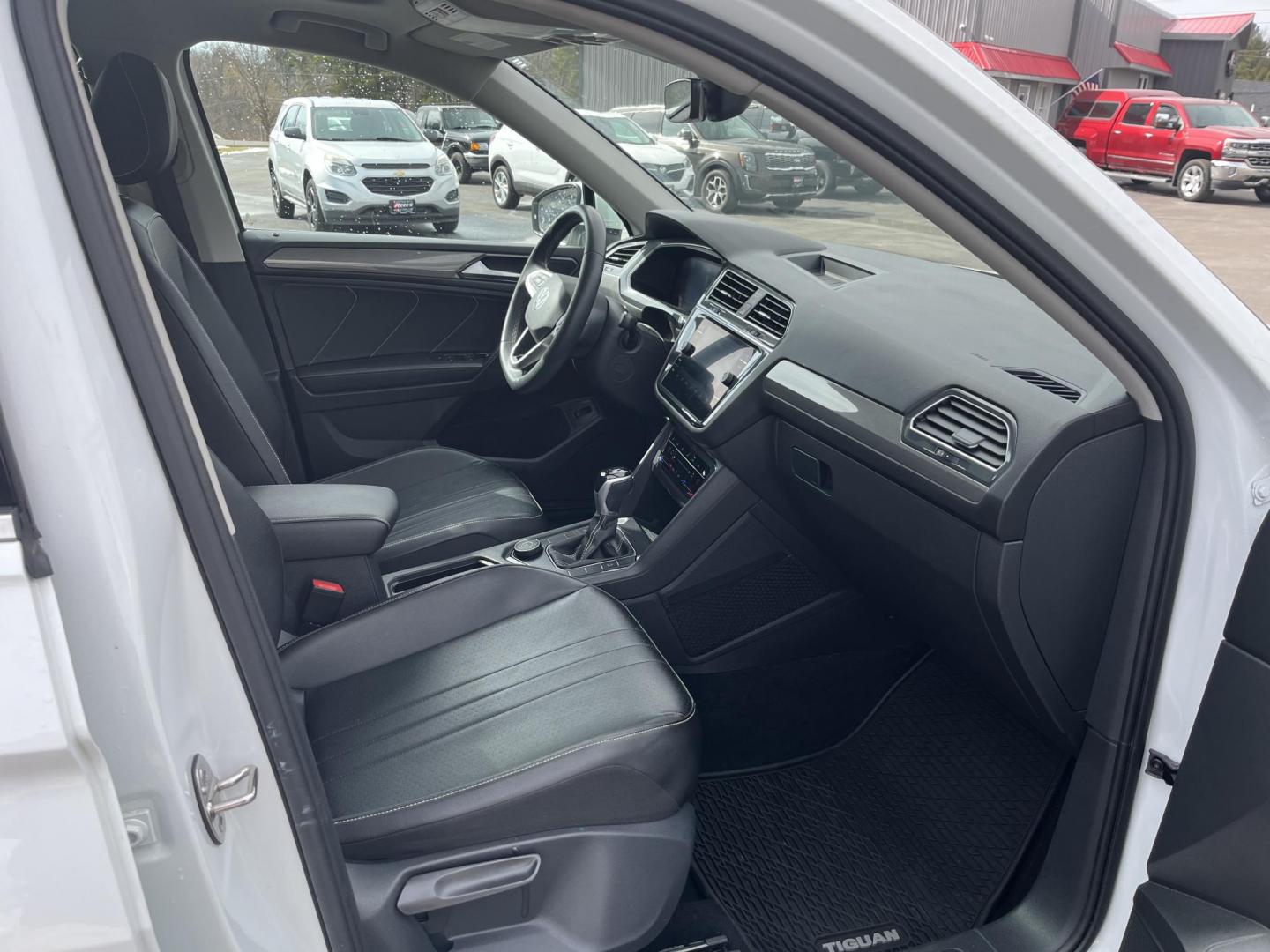 2022 White /Black Volkswagen Tiguan SE 4Motion (3VV2B7AX6NM) with an 2.0L I4 DOHC 16V Turbo engine, Automatic transmission, located at 11115 Chardon Rd. , Chardon, OH, 44024, (440) 214-9705, 41.580246, -81.241943 - 2022 Volkswagen Tiguan SE AWD – Premium Comfort, All-Weather Confidence, and Loaded with Advanced Safety & Tech! This 2022 Volkswagen Tiguan SE AWD is the perfect upscale crossover that’s ready for family adventures, daily commutes, or weekend getaways! Powered by a responsive 2.0L Turbocharged - Photo#43