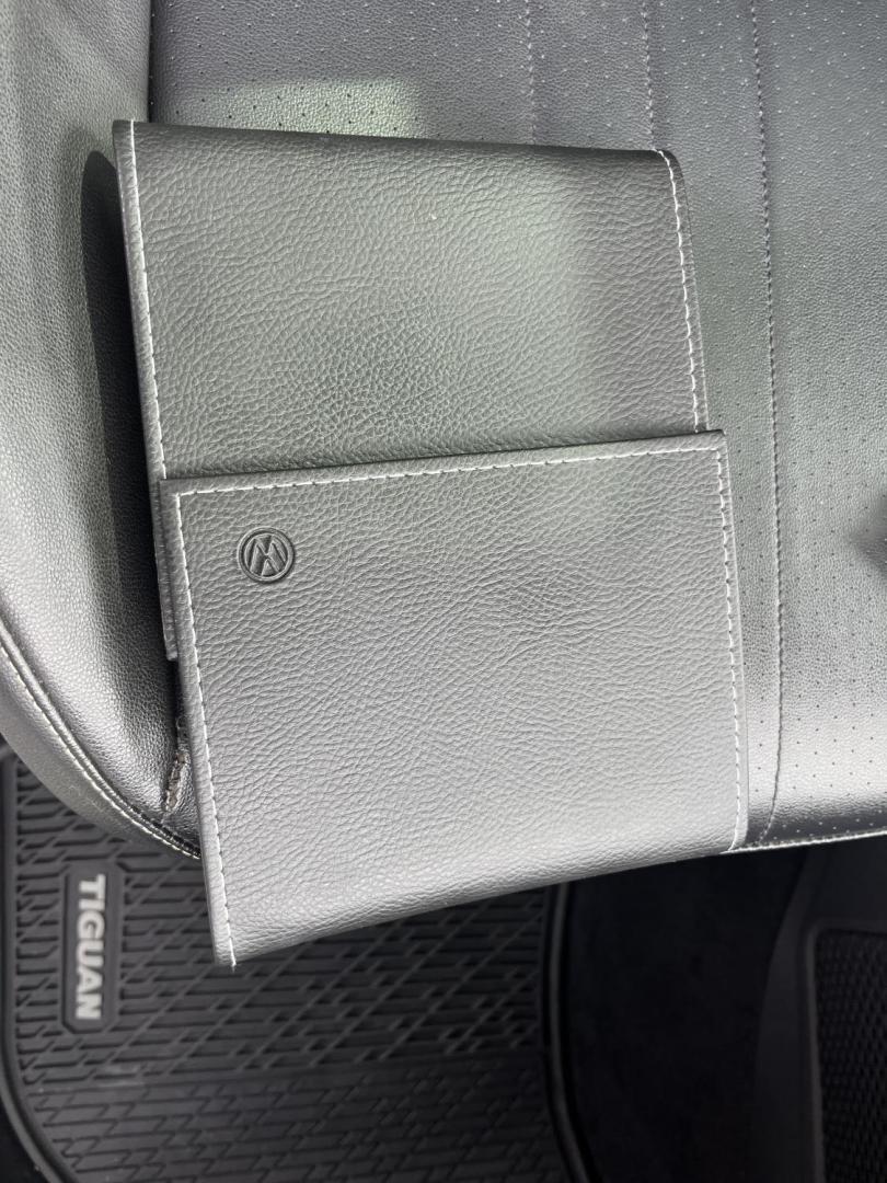 2022 White /Black Volkswagen Tiguan SE 4Motion (3VV2B7AX6NM) with an 2.0L I4 DOHC 16V Turbo engine, Automatic transmission, located at 11115 Chardon Rd. , Chardon, OH, 44024, (440) 214-9705, 41.580246, -81.241943 - 2022 Volkswagen Tiguan SE AWD – Premium Comfort, All-Weather Confidence, and Loaded with Advanced Safety & Tech! This 2022 Volkswagen Tiguan SE AWD is the perfect upscale crossover that’s ready for family adventures, daily commutes, or weekend getaways! Powered by a responsive 2.0L Turbocharged - Photo#45